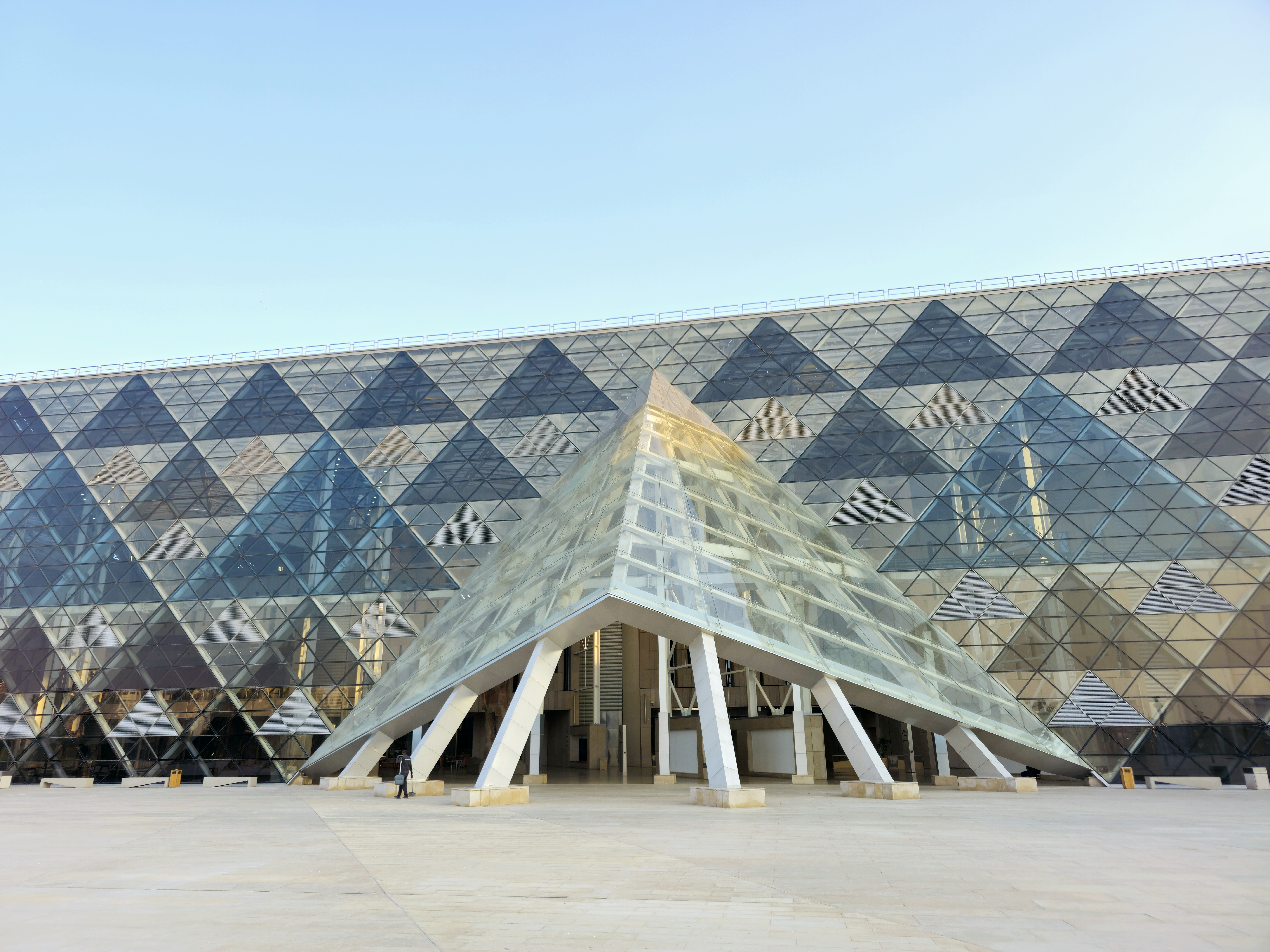 Giza, Egypt, April 13 2024: Exterior view of GEM The Grand Egyptian Museum, New Giza Museum, Egypt's gift to the world, the largest archaeological museum in the world, near the Giza pyramid complex, selective focus
