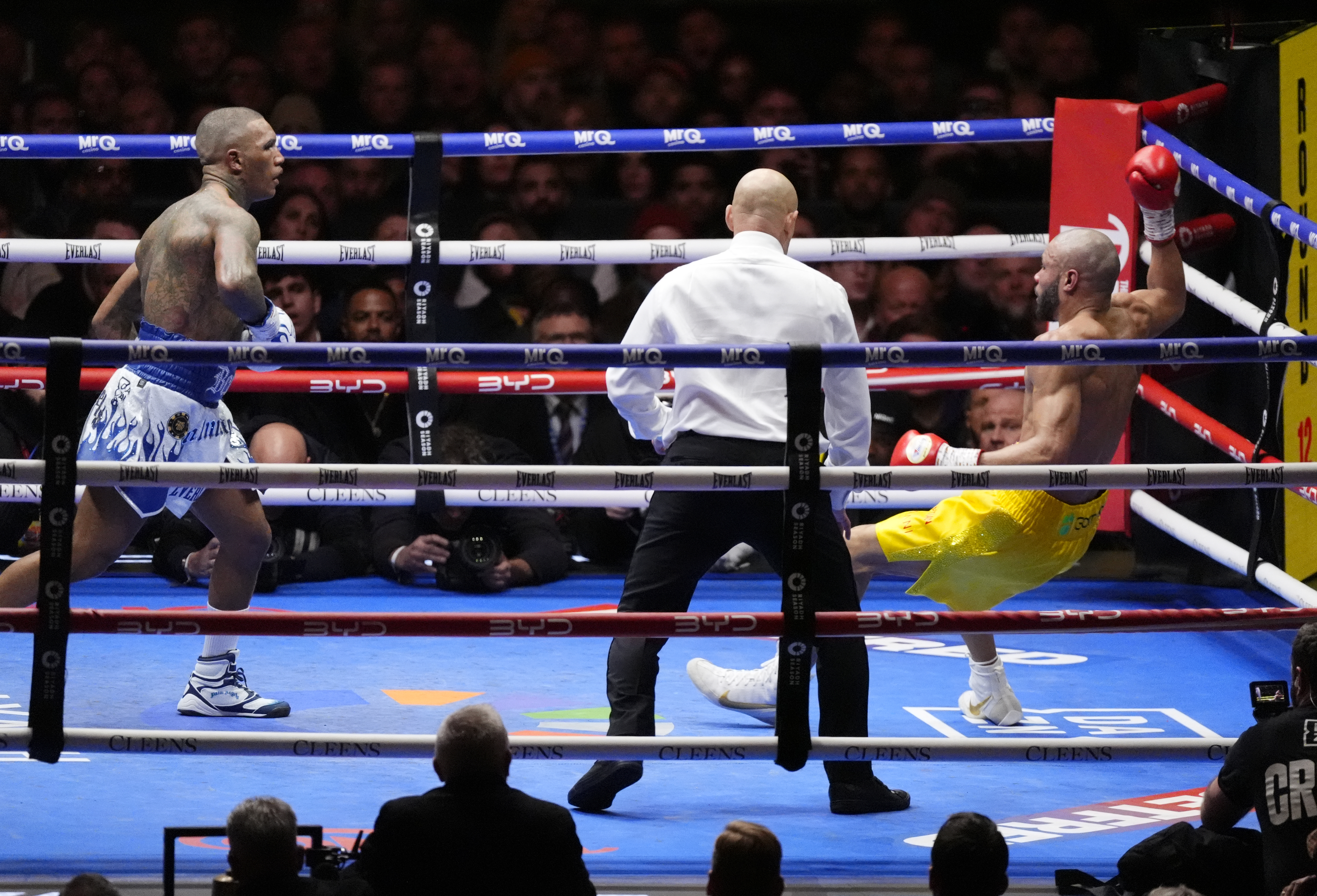 Chris Eubank Jr and Conor Benn in action.