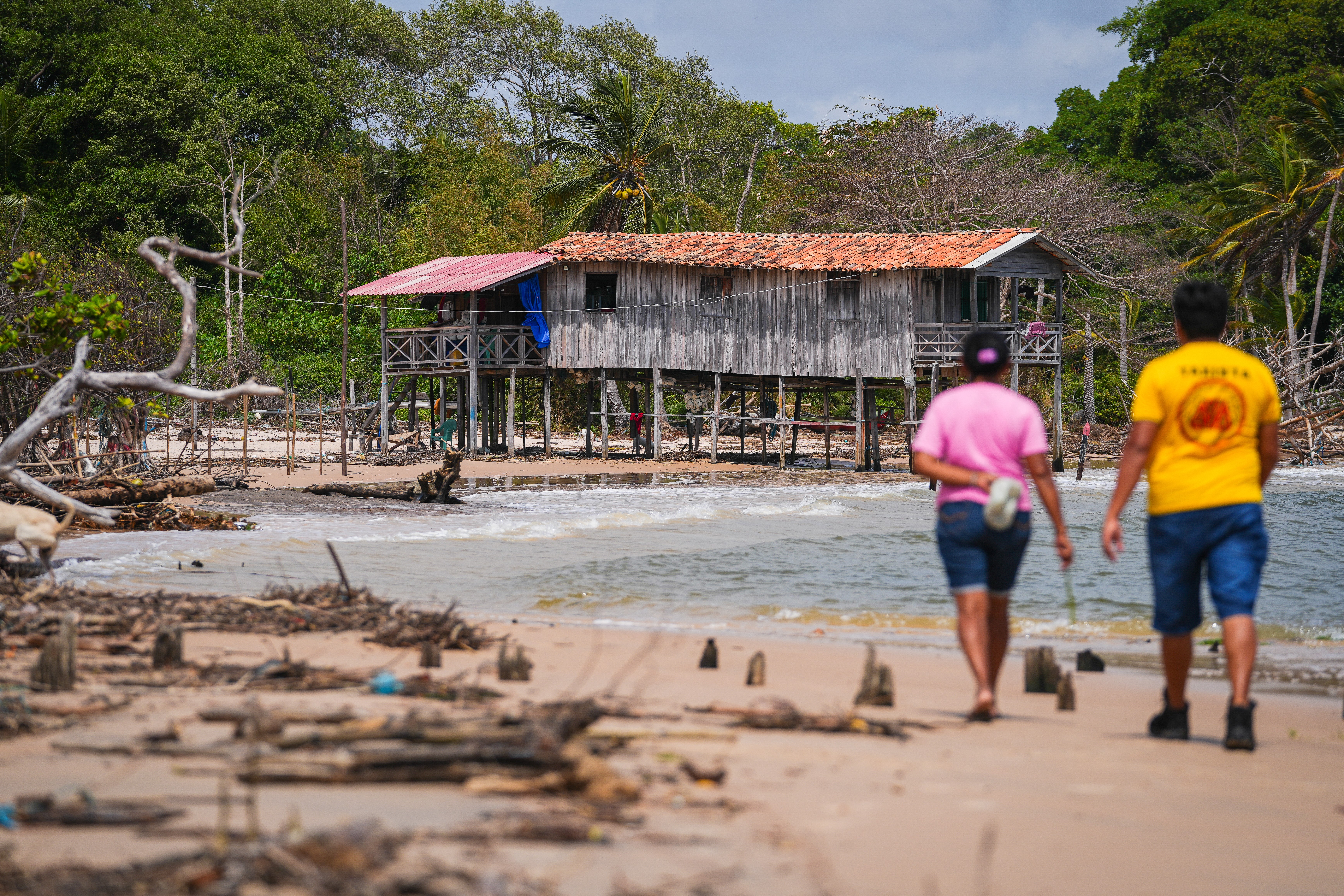 Rising tides and coastal devastation have reshaped life in Marajó, washing away homes and livelihoods along the shore.