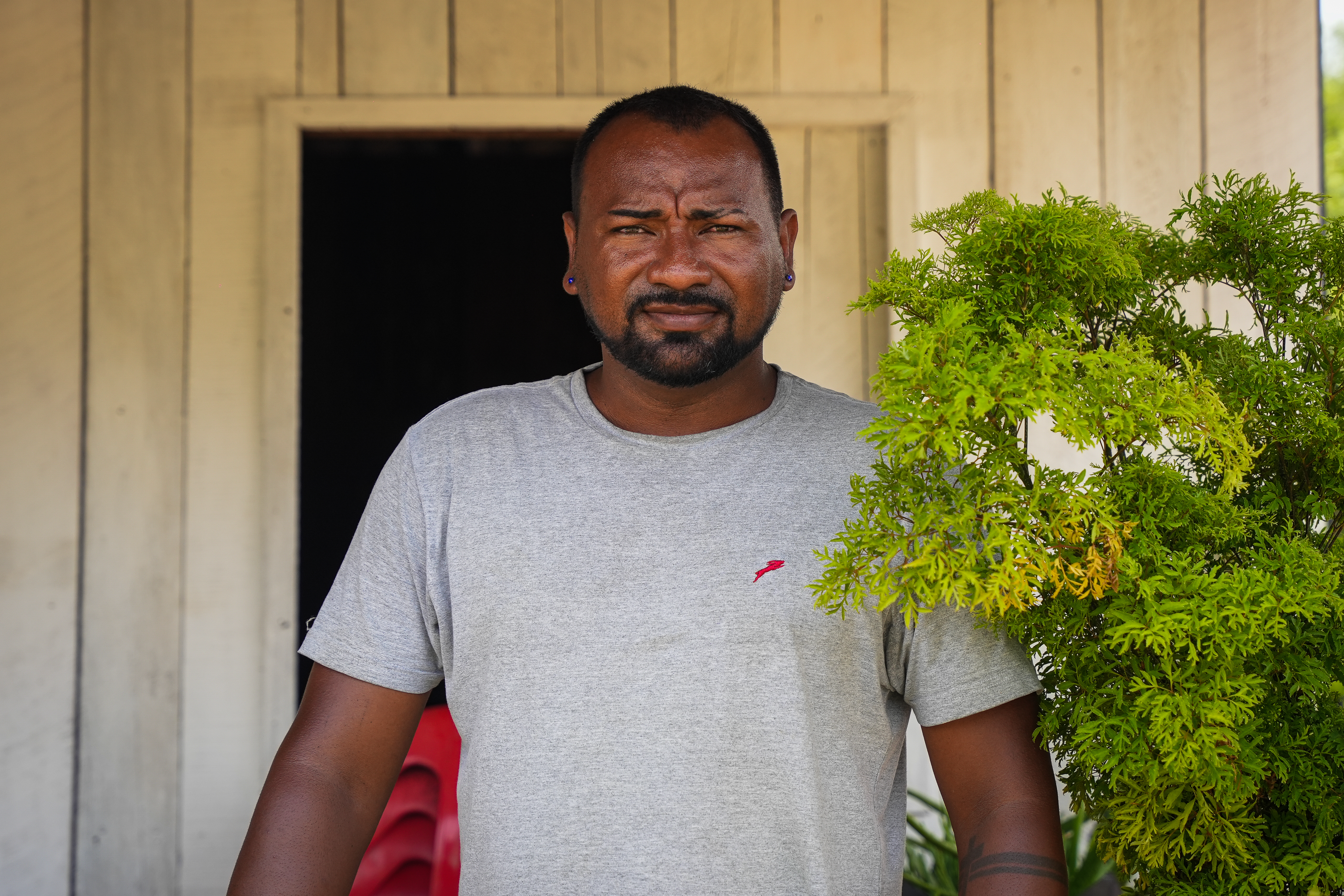 Though Jhonny moved with his mother, Ivanil, to higher ground, his thoughts remain with the families still living by the canal.