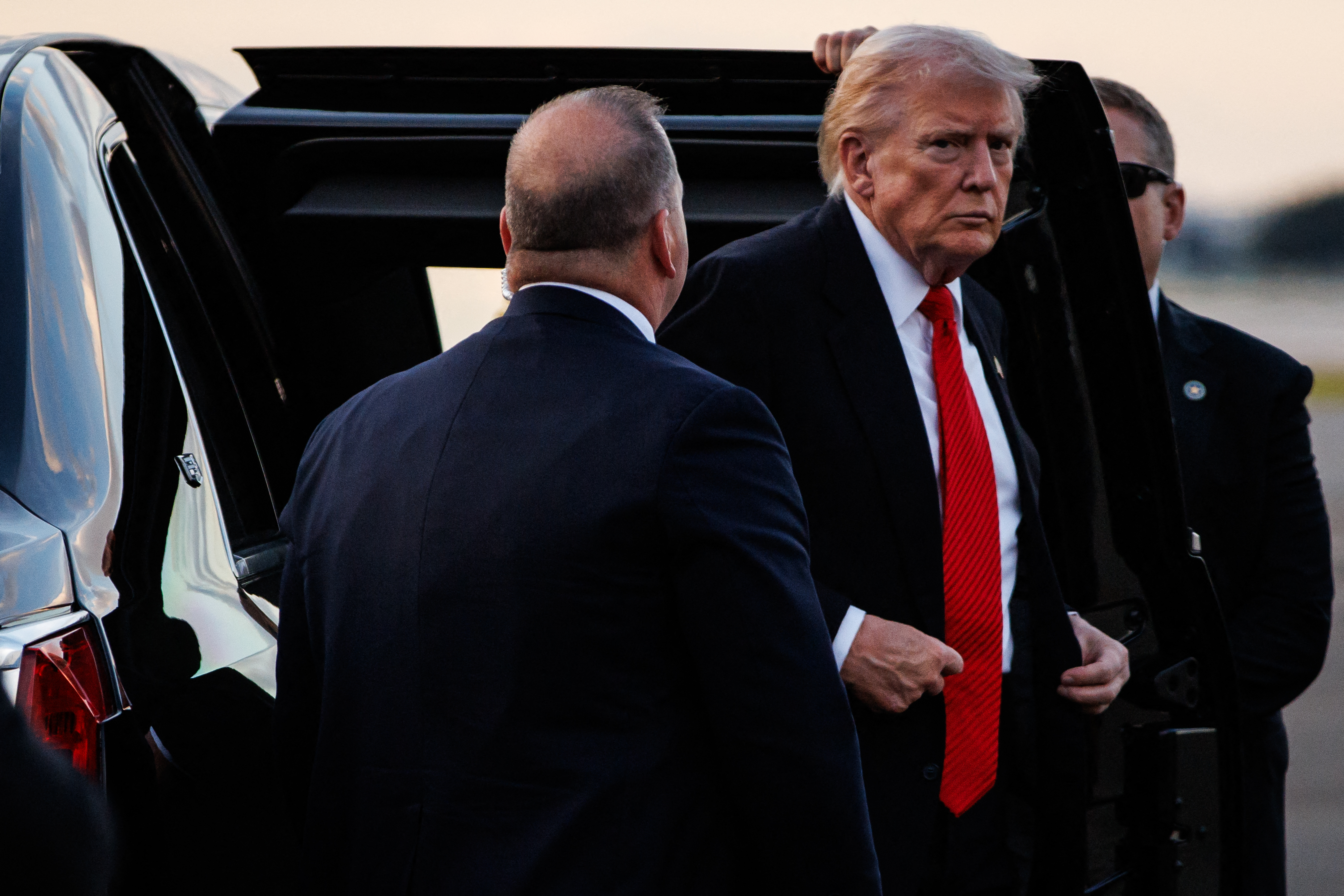 WEST PALM BEACH, FLORIDA - NOVEMBER 2: U.S. President Donald Trump steps out of the Presidential limousine before boarding Air Force One en route to the White House on November 2, 2025 at Palm Beach International Airport in West Palm Beach, Florida. Trump spent the weekend at his Mar-A-Lago estate in Palm Beach, Florida. Samuel Corum/Getty Images/AFP (Photo by Samuel Corum / GETTY IMAGES NORTH AMERICA / Getty Images via AFP)