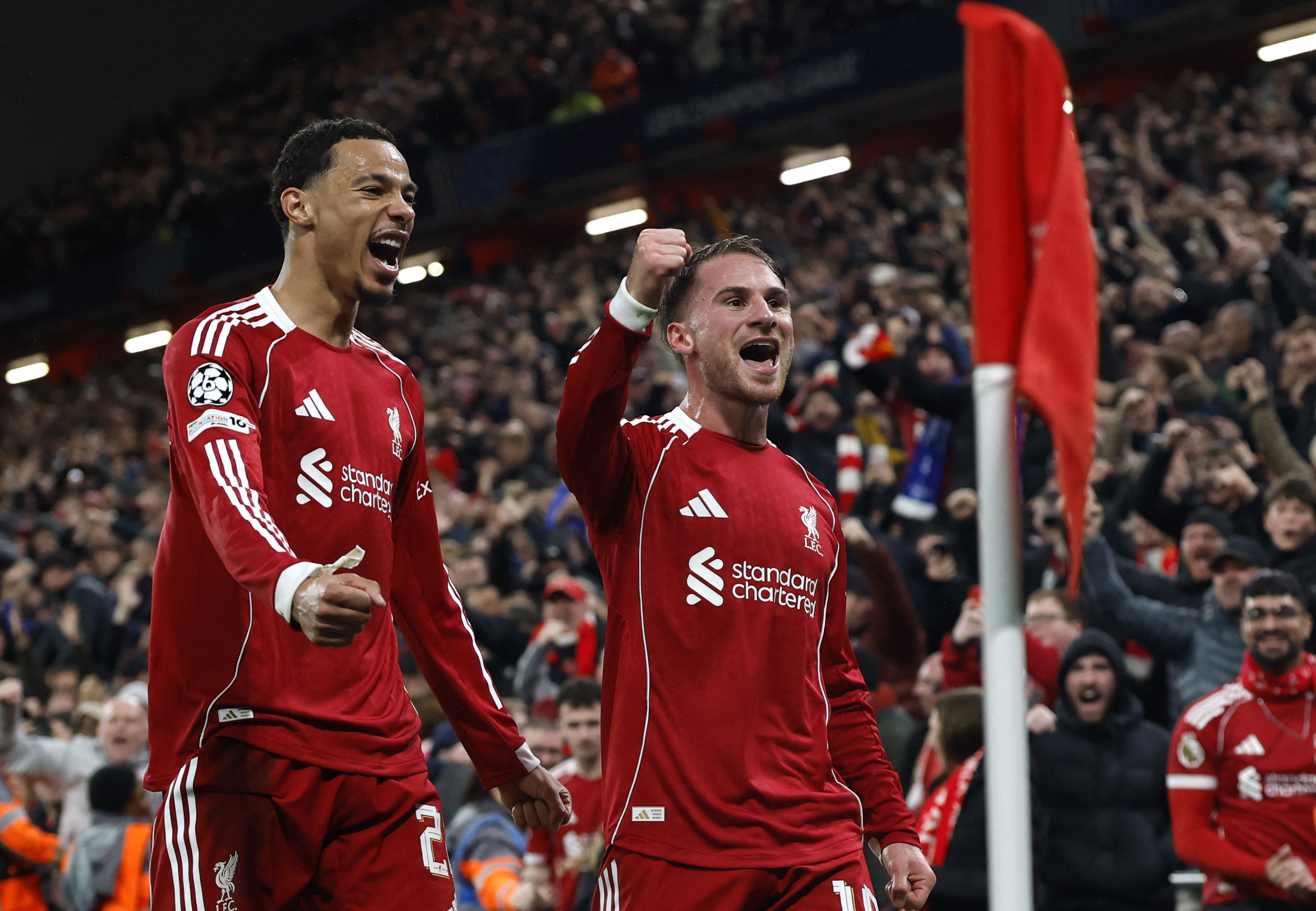 Soccer Football - UEFA Champions League - Liverpool v Real Madrid - Anfield, Liverpool, Britain - November 4, 2025 Liverpool's Alexis Mac Allister celebrates scoring their first goal with Hugo Ekitike Action Images via Reuters/Jason Cairnduff