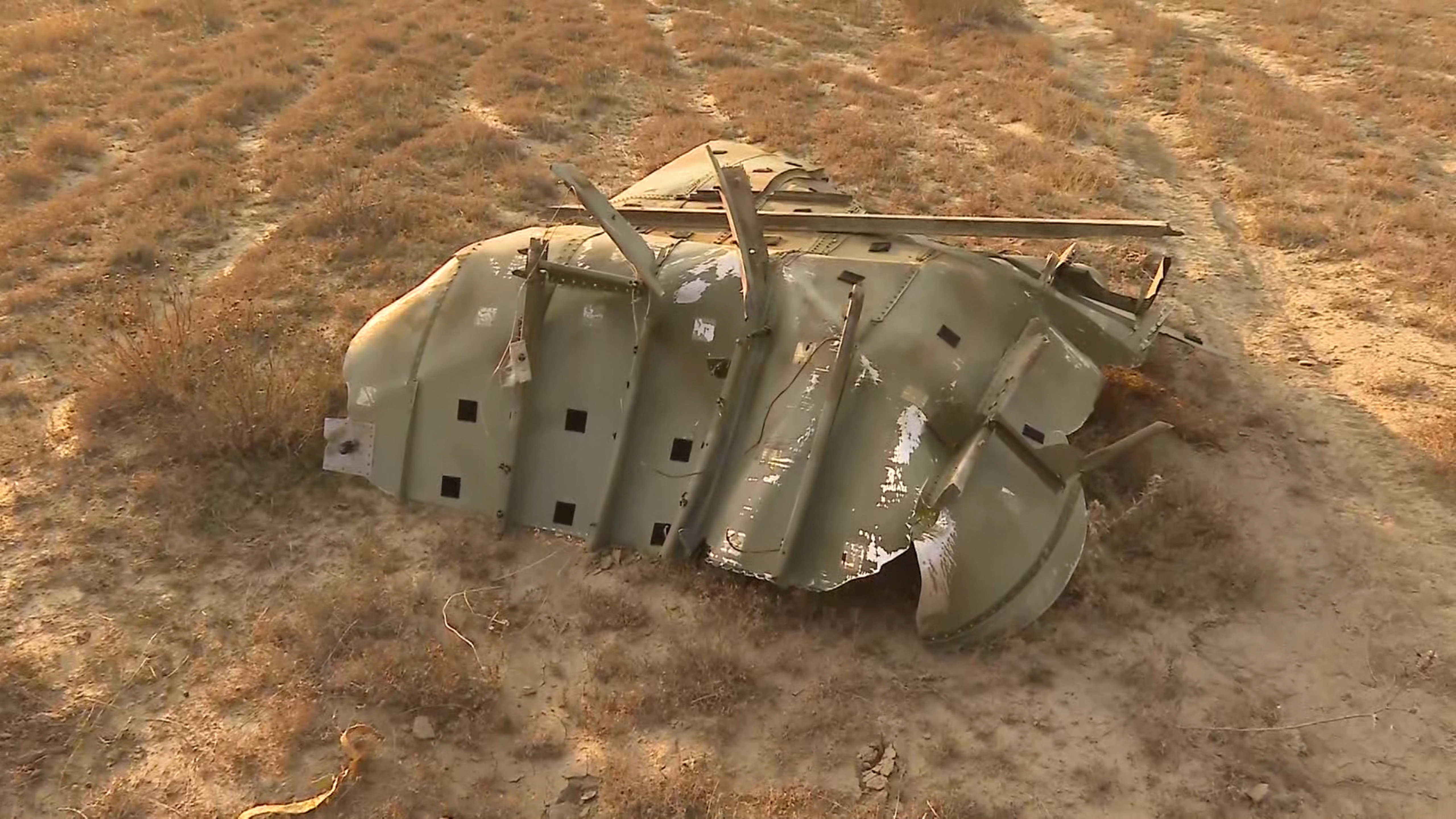 Wreckage lies at the site of the Turkish C-130 military cargo plane crash near the Azerbaijani border, in Sighnaghi municipality, Georgia, November 11, 2025, in this still image taken from video. TV.IMEDI/Handout via REUTERS ATTENTION EDITORS - THIS IMAGE WAS PROVIDED BY A THIRD PARTY. NO RESALES. NO ARCHIVES. MANDATORY CREDIT.