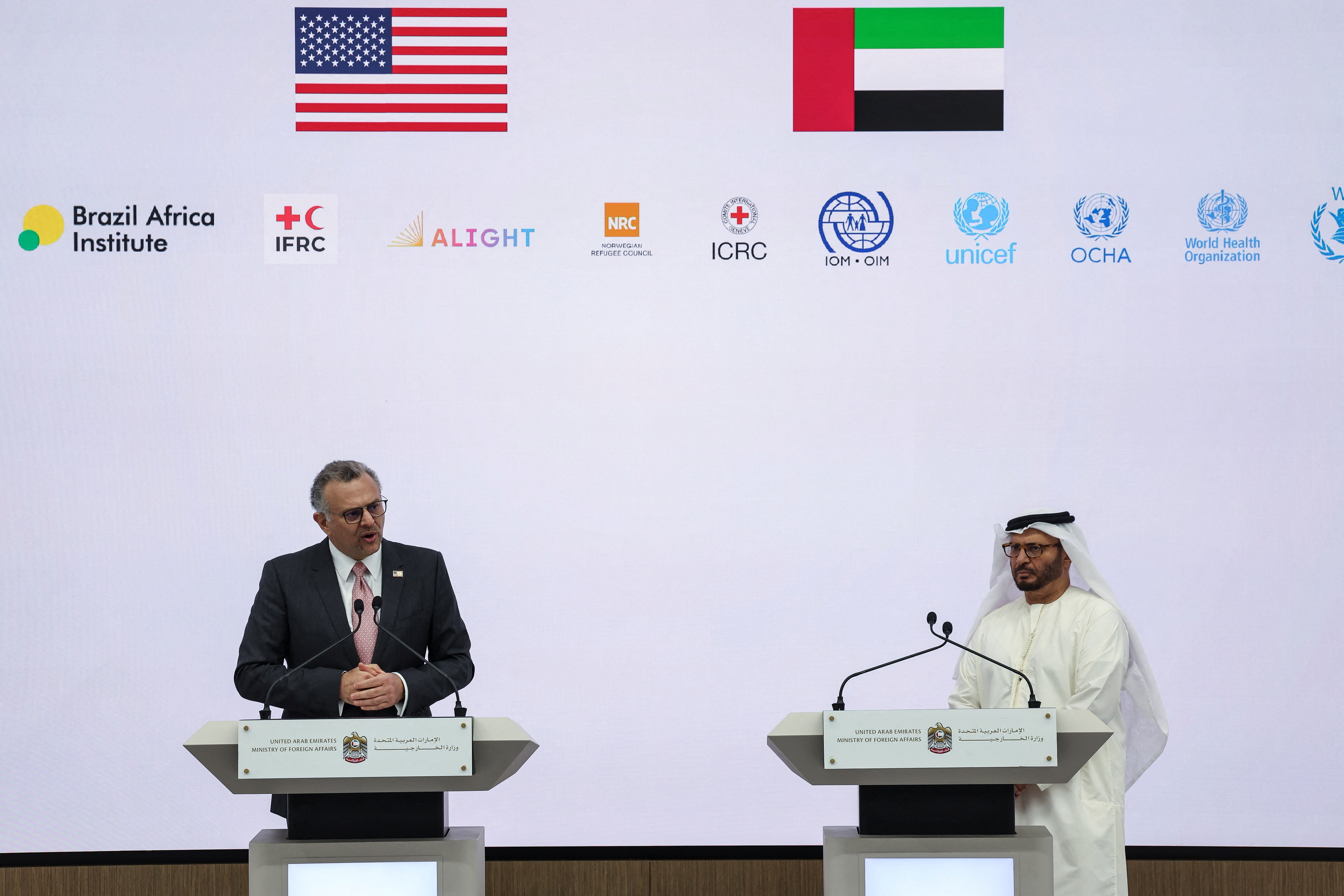Diplomatic advisor to the UAE president, Anwar Gargash, stands as U.S. Senior Advisor for Arab and African Affairs, Massad Boulos, speaks during a press conference on the ongoing conflict in Sudan, in Abu Dhabi, United Arab Emirates, November 25, 2025. REUTERS/Amr Alfiky