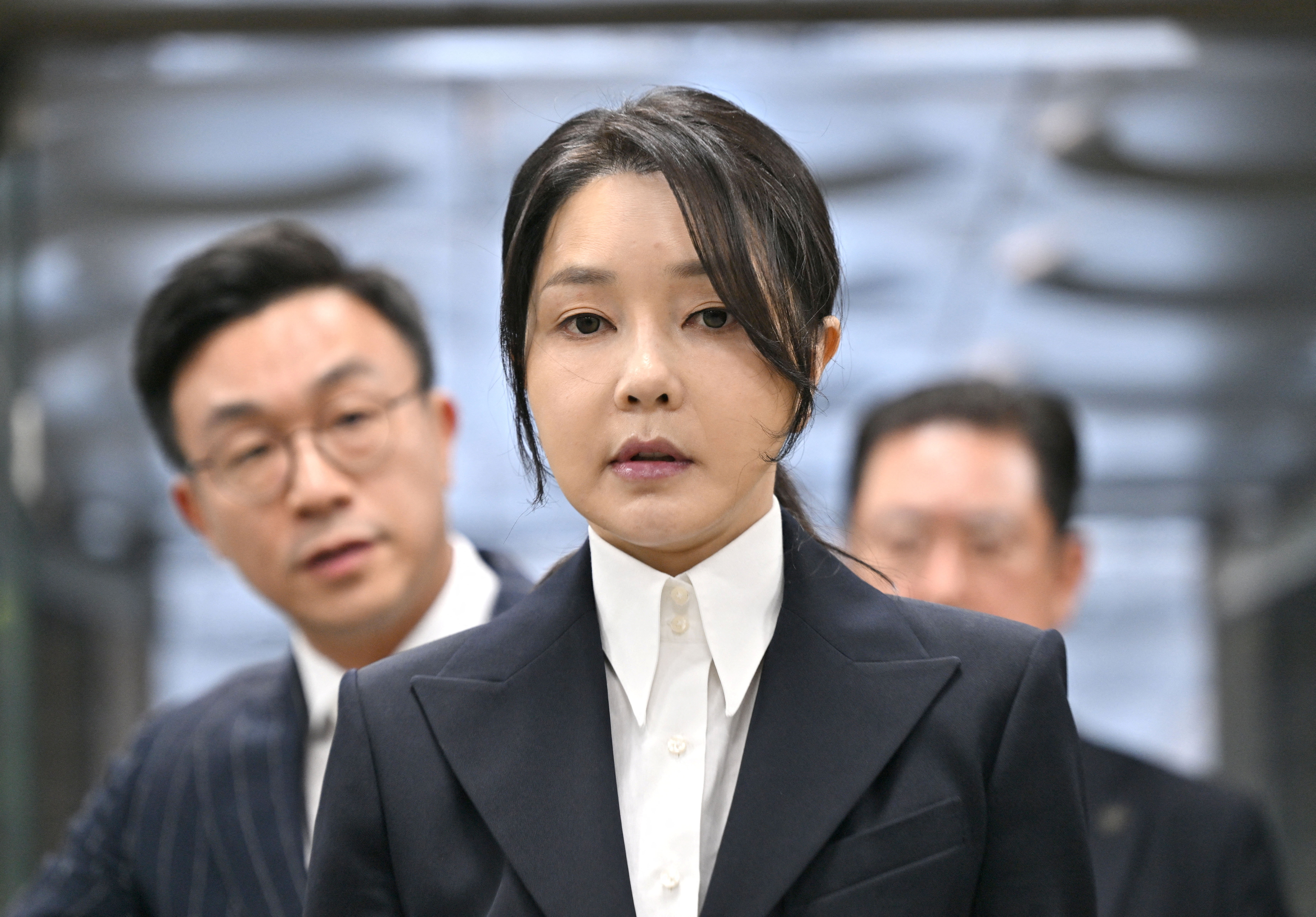 South Korea's former first lady, Kim Keon-hee, wife of impeached ex-President Yoon Suk-yeol, arrives in a court to attend a hearing in Seoul in August 2025