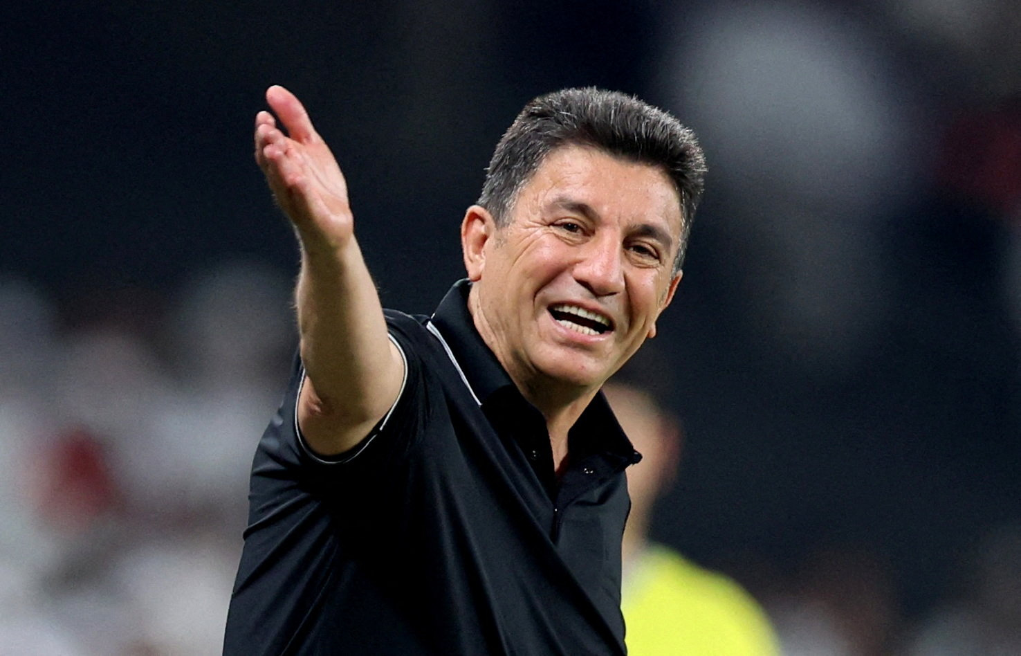 Iran coach Amir Ghalenoei reacts.