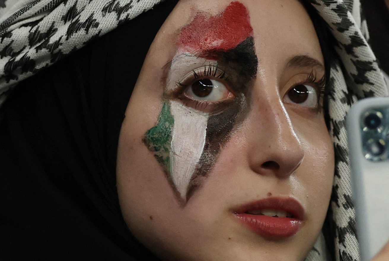 Soccer Football - FIFA Arab Cup - Qatar 2025 - Group A - Syria v Palestine - Education City Stadium, Al Rayyan, Qatar - December 7, 2025 Palestine fan REUTERS/Mohammed Salem