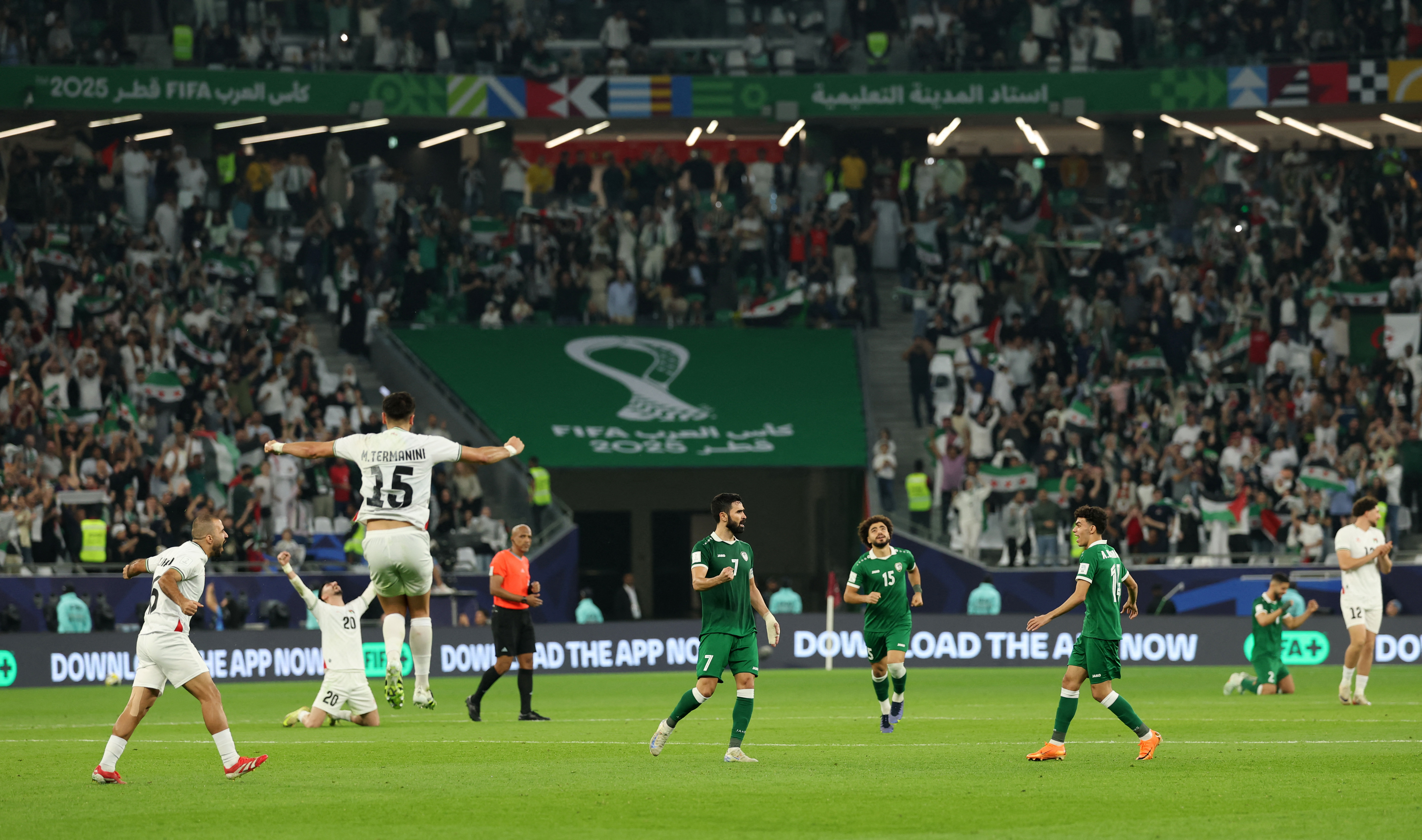 Soccer Football - FIFA Arab Cup - Qatar 2025 - Group A - Syria v Palestine - Education City Stadium, Al Rayyan, Qatar - December 7, 2025 Syria and Palestine players celebrate after qualifying for the knockout stage REUTERS/Mohammed Salem