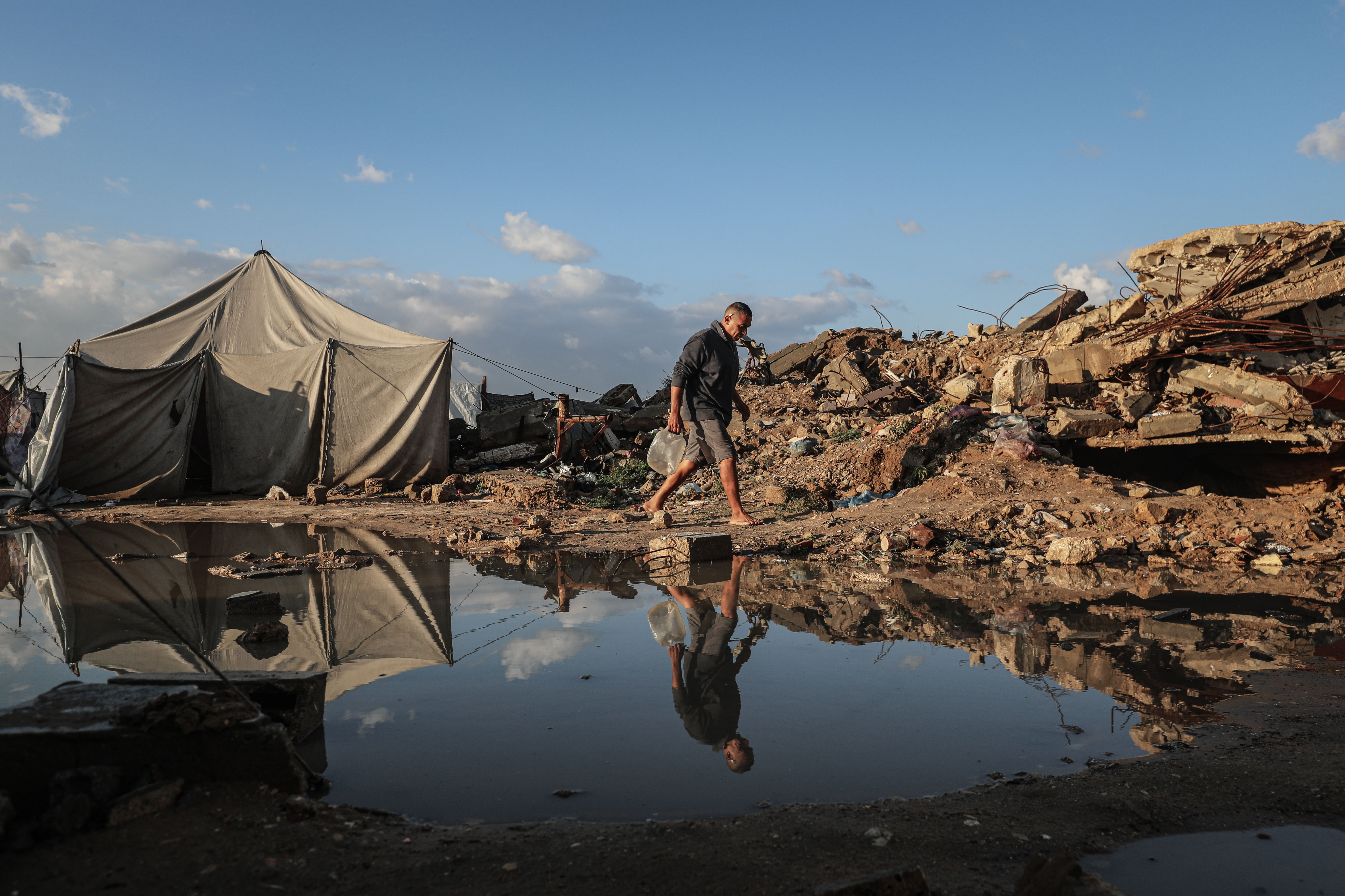 Flooding hits displaced Palestinians’ tents after heavy rain in Gaza