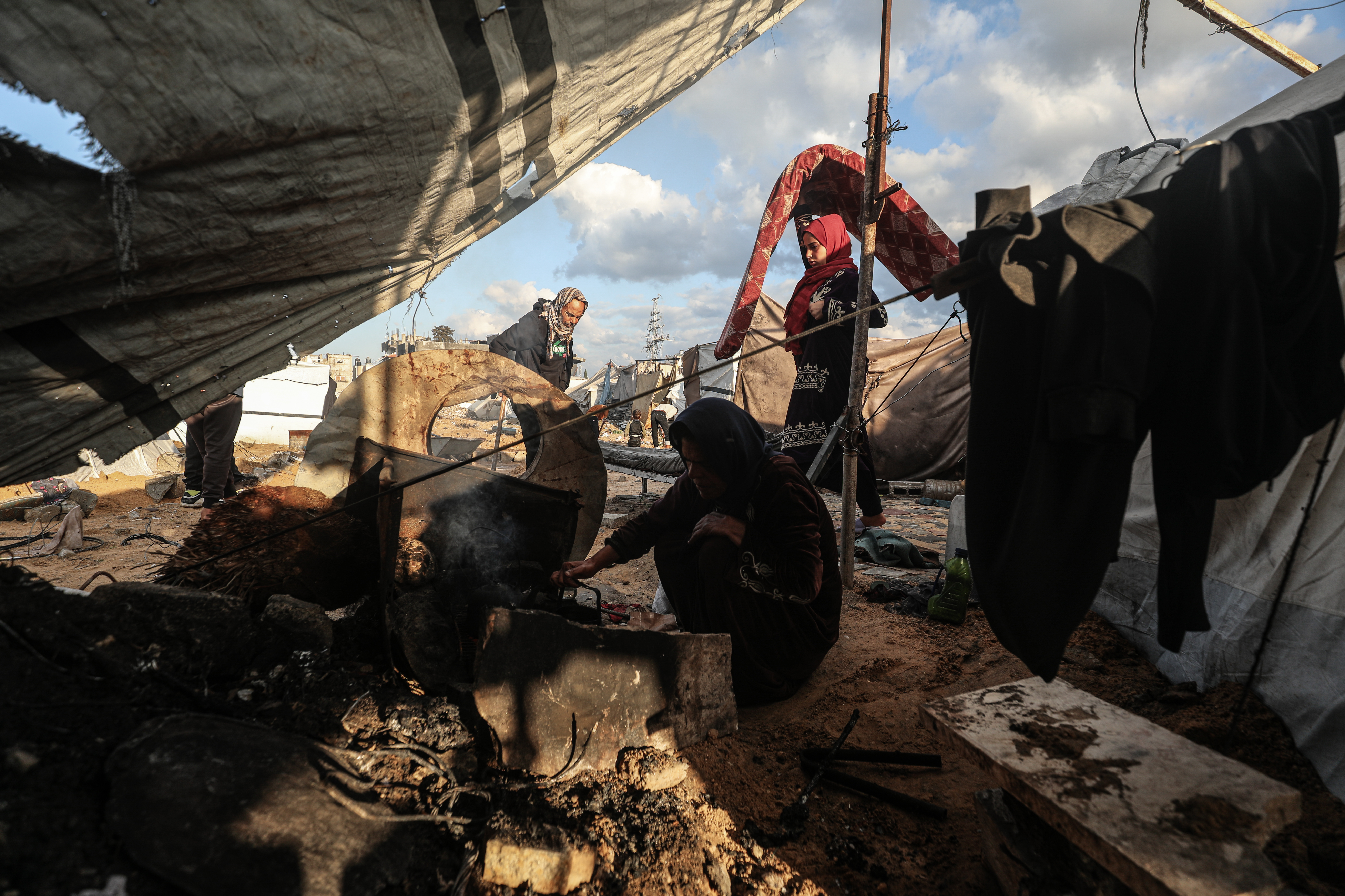 Flooding hits displaced Palestinians’ tents after heavy rain in Gaza