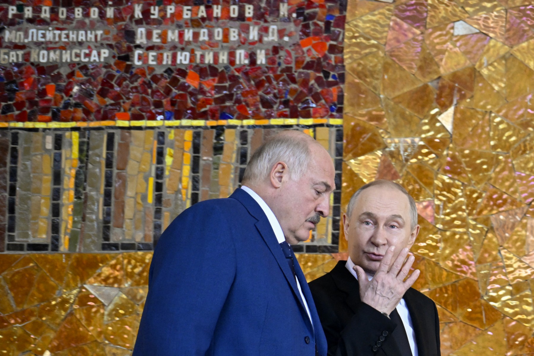 Russian President Vladimir Putin and Belarus' President Alexander Lukashenko attend a wreath-laying ceremony at the Eternal Flame in the Hall of Military Glory at the Mamayev Kurgan World War Two (WWII) Memorial complex in Russia's southern city of Volgograd on April 29, 2025, as part of commemorative events for the upcoming 80th anniversary of the Soviet Union's victory over Nazi Germany during WWII, which will be celebrated on May 9. (Photo by Alexander NEMENOV / AFP)