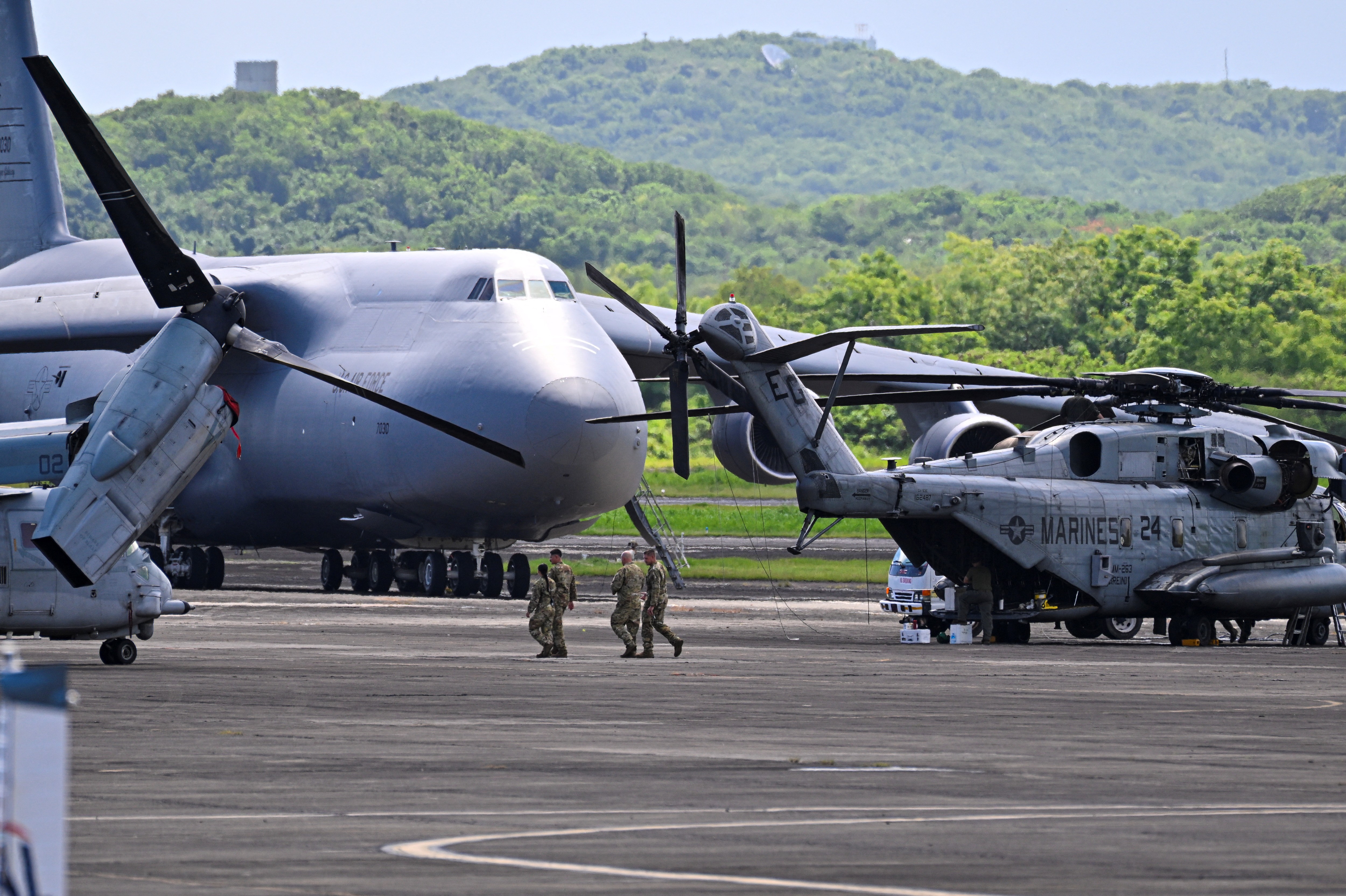 A US Air Force Boeing C-5 Galaxy is parked at José Aponte de la Torre Airport, formerly Roosevelt Roads Naval Station, on September 13, 2025 in Ceiba, Puerto Rico. President Donald Trump is sending ten F-35 fighter jets to Puerto Rico as part of his war on drug cartels, sources familiar with the matter told AFP on September 5, as tensions mount with Venezuela over Washington's military build-up in the Caribbean. The planes will join US warships already deployed to the southern Caribbean as Trump steps up pressure on Venezuelan President Nicolas Maduro, whom the United States accuses of leading a drug cartel. The Trump administration recently carried out a drone strike in the southern Caribbean against a boat that had left Venezuela and was suspected of transporting drugs. Eleven people died in the attack. The president claimed that the vessel was operated by the Venezuelan gang Tren de Aragua. (Photo by Miguel J. Rodriguez Carrillo / AFP)