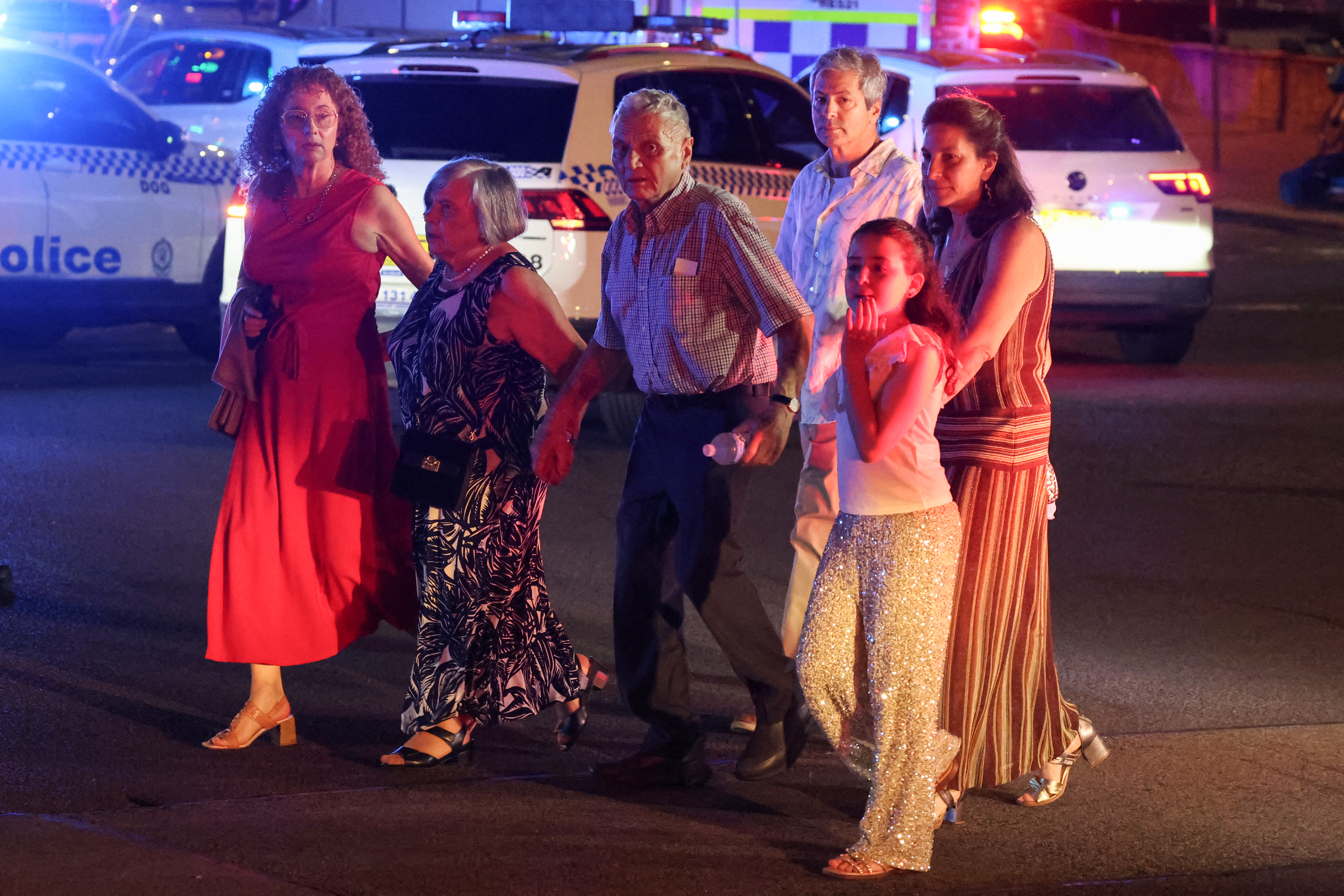 Police work on a street after a shooting incident at Bondi Beach