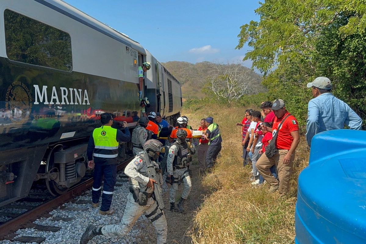 Mexican Army soldiers and Civil Protection members rescue passengers from the Interoceanic train that derailed in Nizanda, Oaxaca state, on the route to Coatzacoalcos, Mexico, on December 28, 2025. At least 20 people were injured on December 28, 2025, after a train crashed in the southern Mexican state of Oaxaca, authorities said. Related content