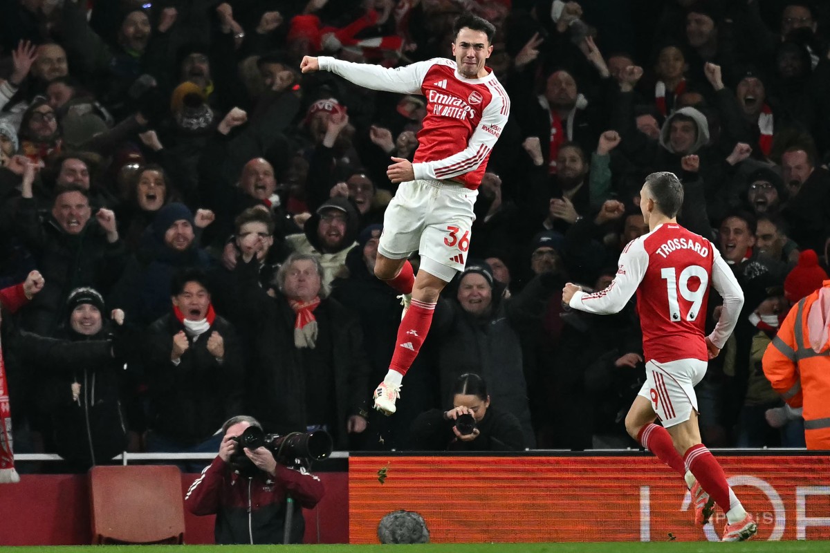 Arsenal's Spanish defender #36 Martin Zubimendi (C) celebrates after scoring their second goal during the English Premier League football match between Arsenal and Aston Villa