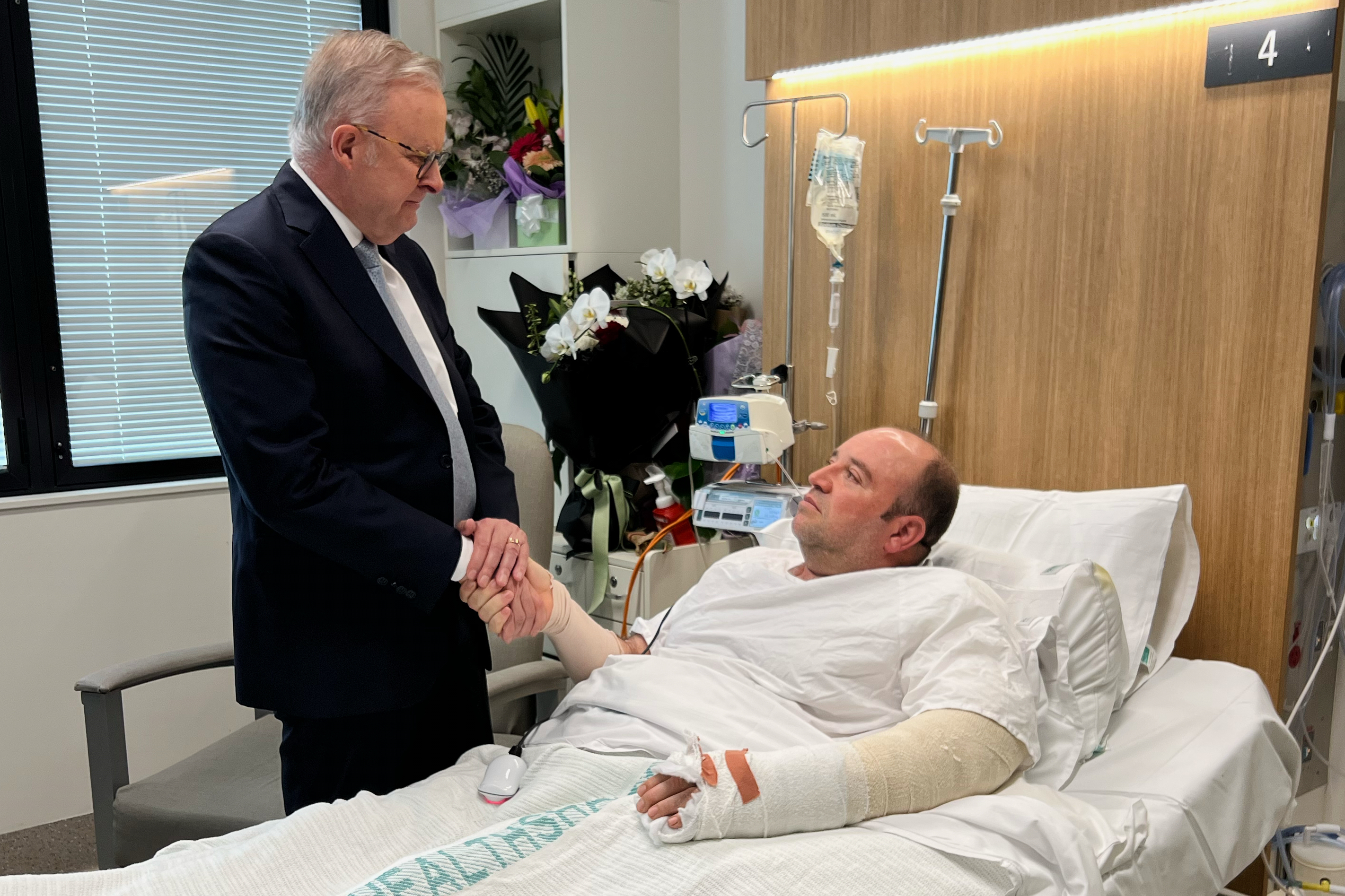 Australian Prime Minister Anthony Albanese meets Ahmed al-Ahmed at the hospital.