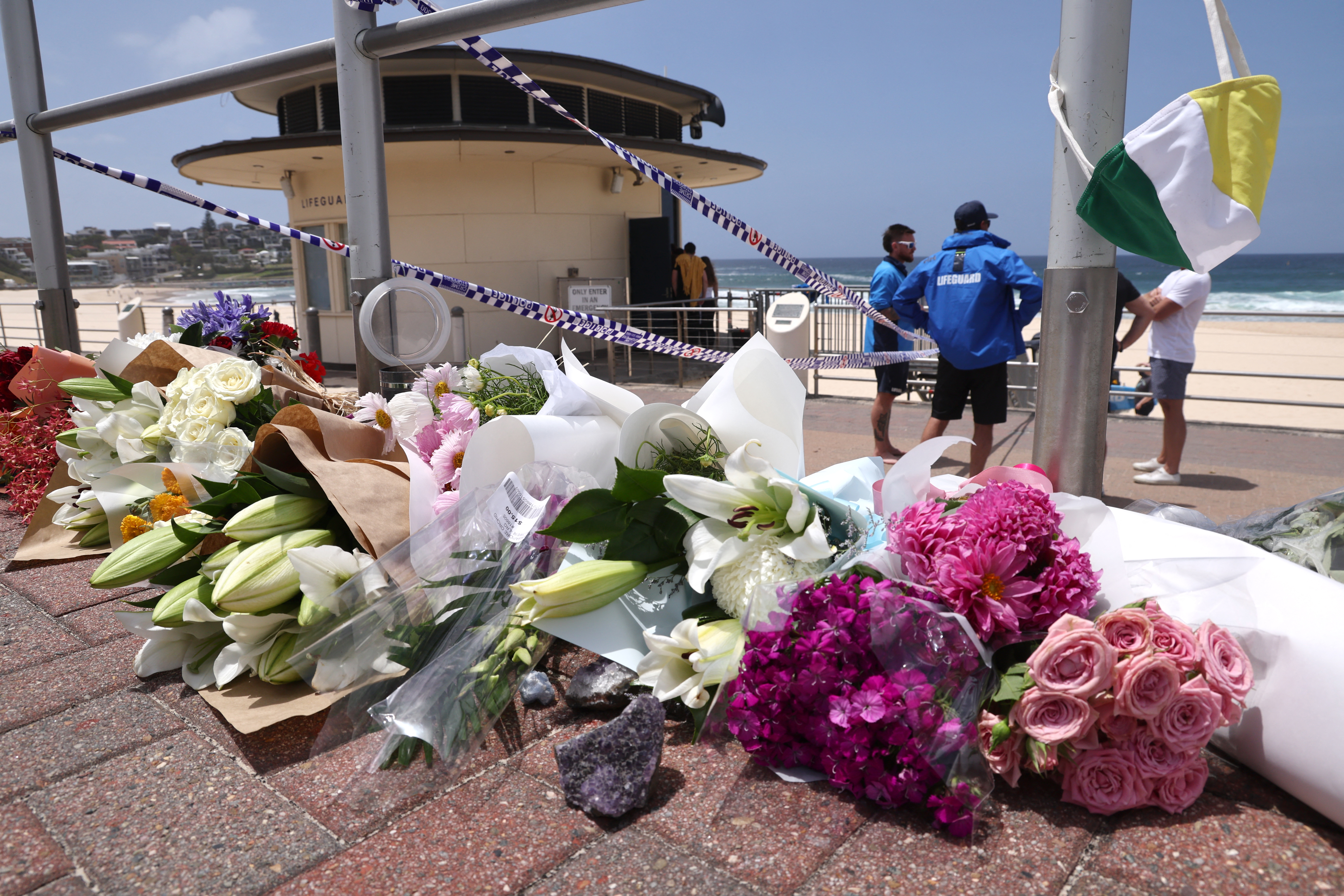 Flowers are placed outside the lifeguard tower at the Bondi Pavilion.