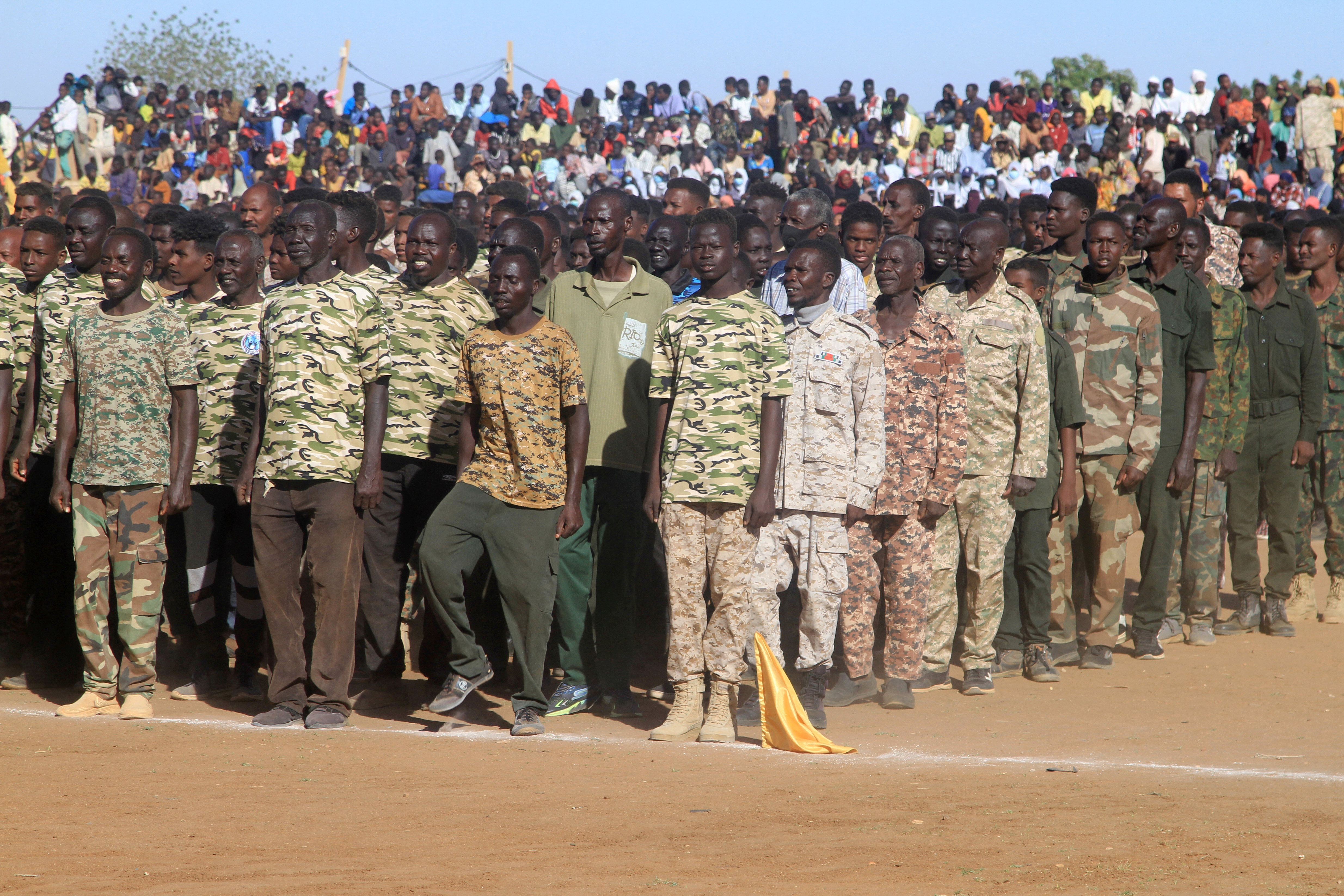 Sudanese soldiers gather after completing a training course, with the aim of supporting the army in Ombada