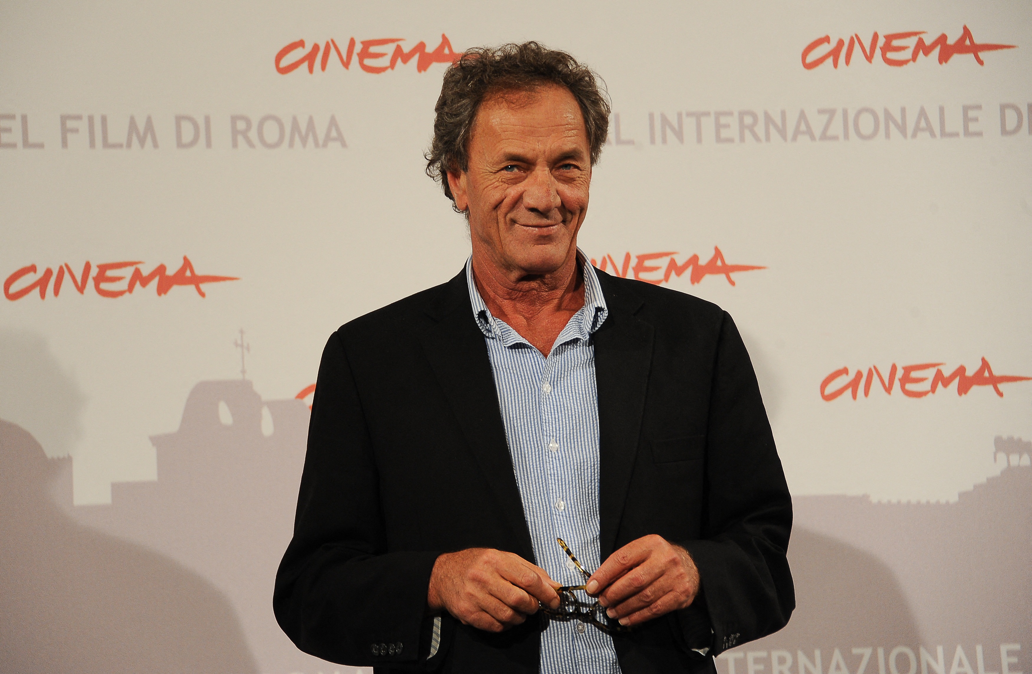 (FILES) Palestinian actor Mohammed Bakri poses during the photocall of "Golakani Kirkuk" (The flowers of Kirkuk) at the fifth Rome Film Festival on November 2, 2010.