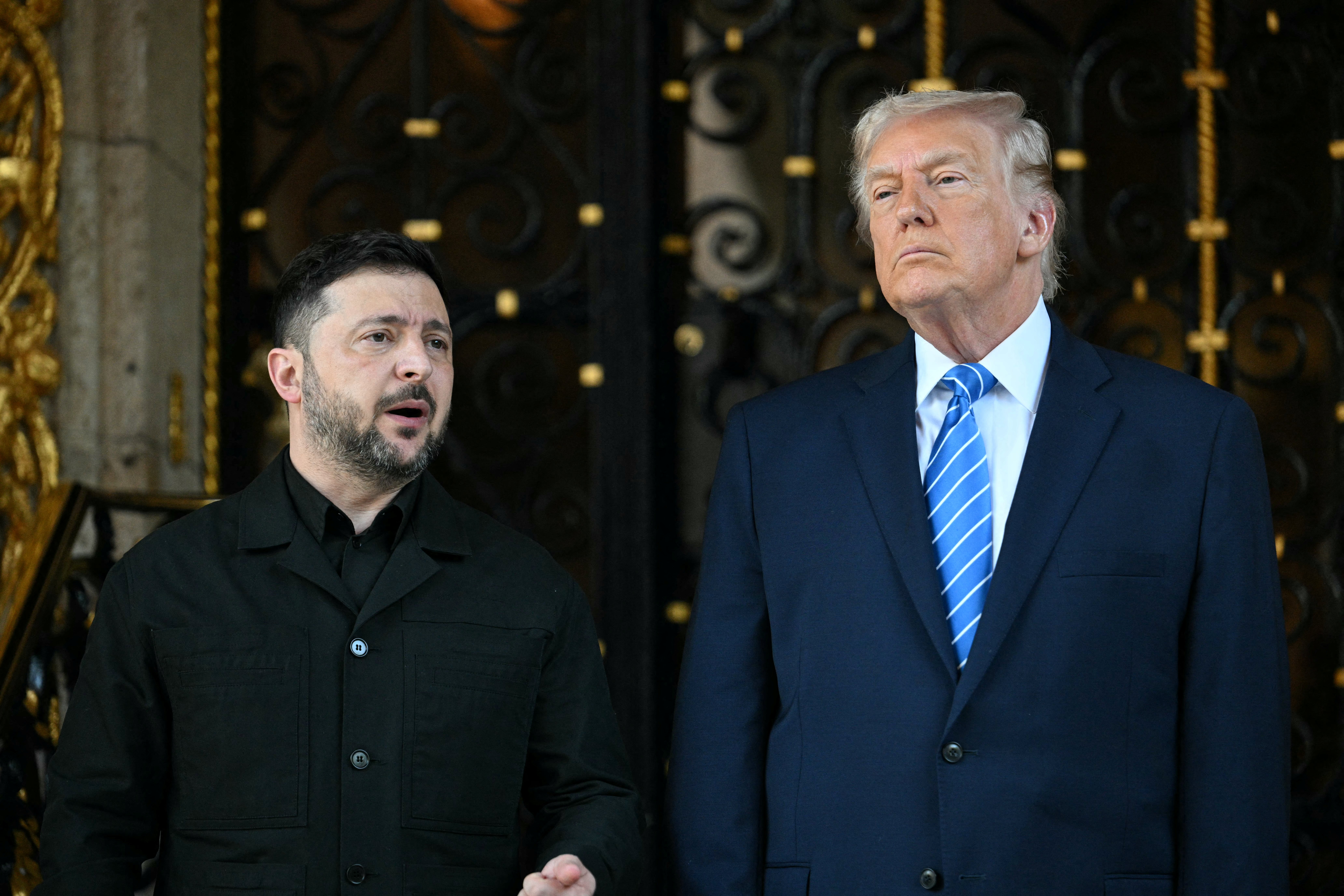 US President Donald Trump welcomes Ukranian President Volodymyr Zelensky at his Mar-a-Lago residence in Palm Beach, Florida, on December 28, 2025. (Photo by Jim WATSON / AFP)