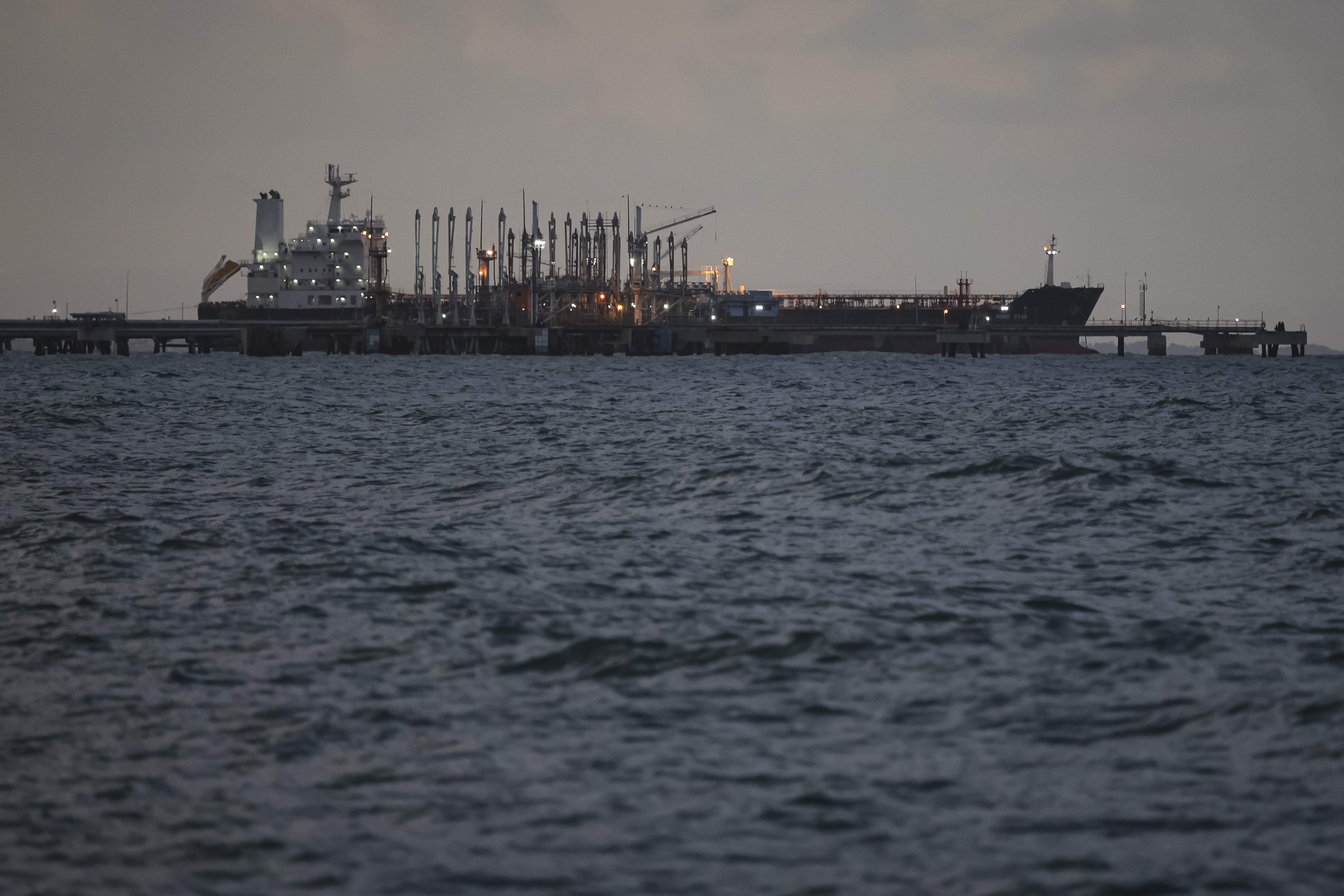 PUERTO CABELLO, VENEZUELA - DECEMBER 18: An oil tanker remains anchored at the dock during a walk around the outskirts of the 'El Palito' refinery on December 18, 2025 in Puerto Cabello, Venezuela. President Trump stated on December 17th that Venezuela took away oil rights from the US. Trump's administration has sanctioned Venezuelan oil with blockades, while many US Navy units are deployed off the coast of Venezuela under the premise of combating the drug cartels. (Photo by Jesus Vargas/Getty Images)