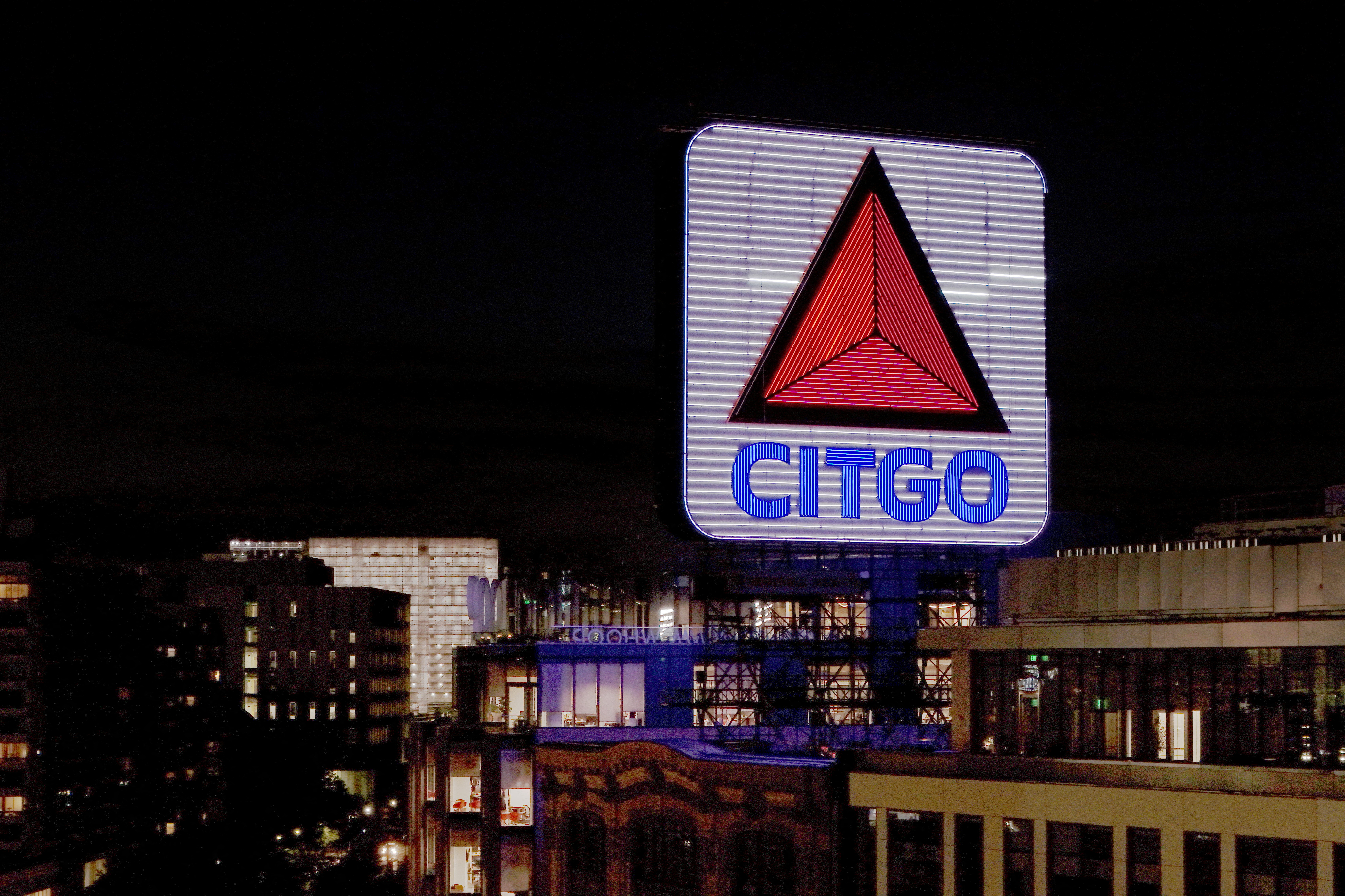FILE PHOTO: A drone view shows the Citgo Sign illuminated over Kenmore Square in Boston, Massachusetts, U.S., September 22, 2025. REUTERS/Brian Snyder/File Photo