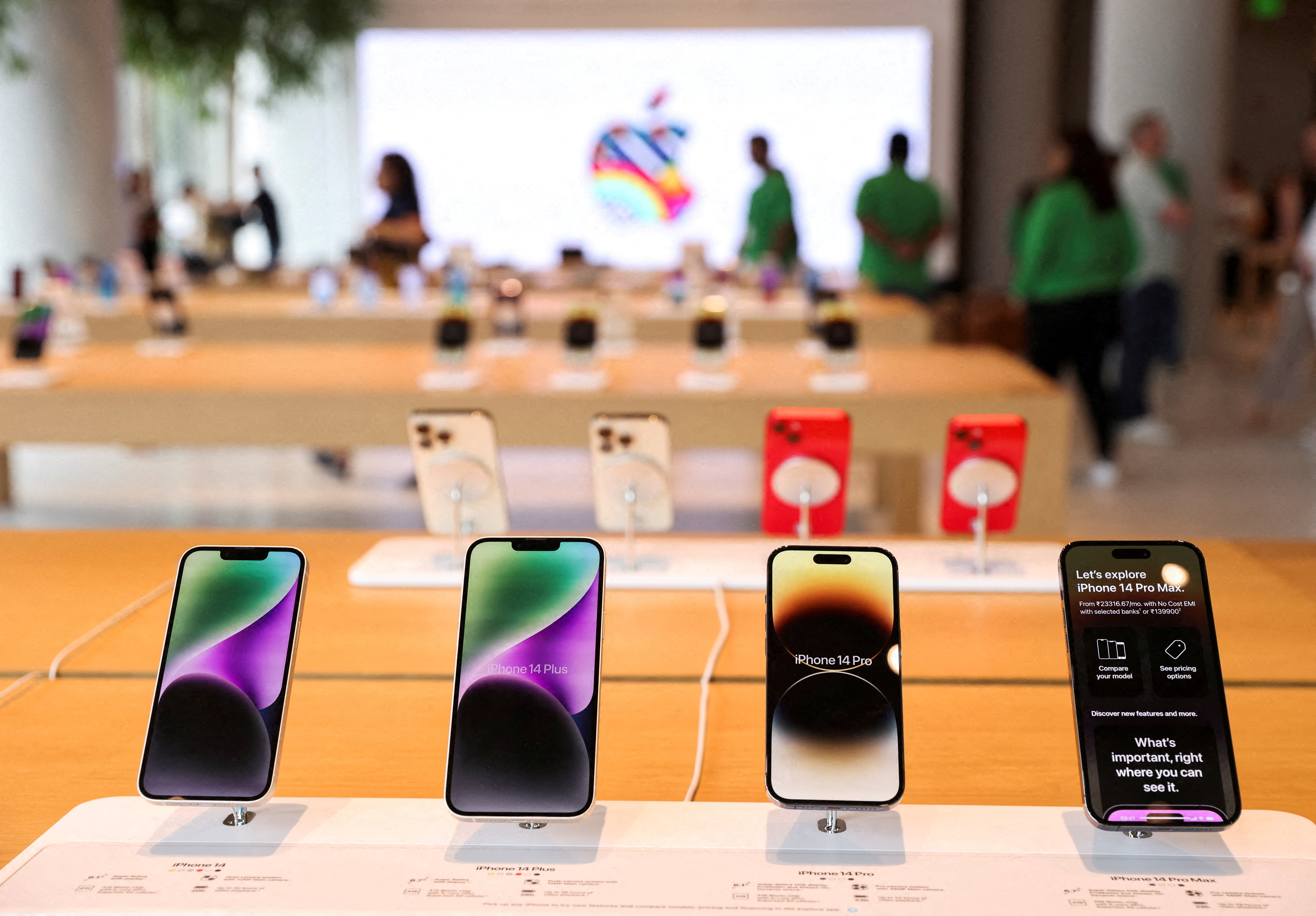 FILE PHOTO: Apple iPhones are seen inside India's first Apple retail store during a media preview, a day ahead of its launch in Mumbai, India, April 17, 2023. REUTERS/Francis Mascarenhas/File Photo