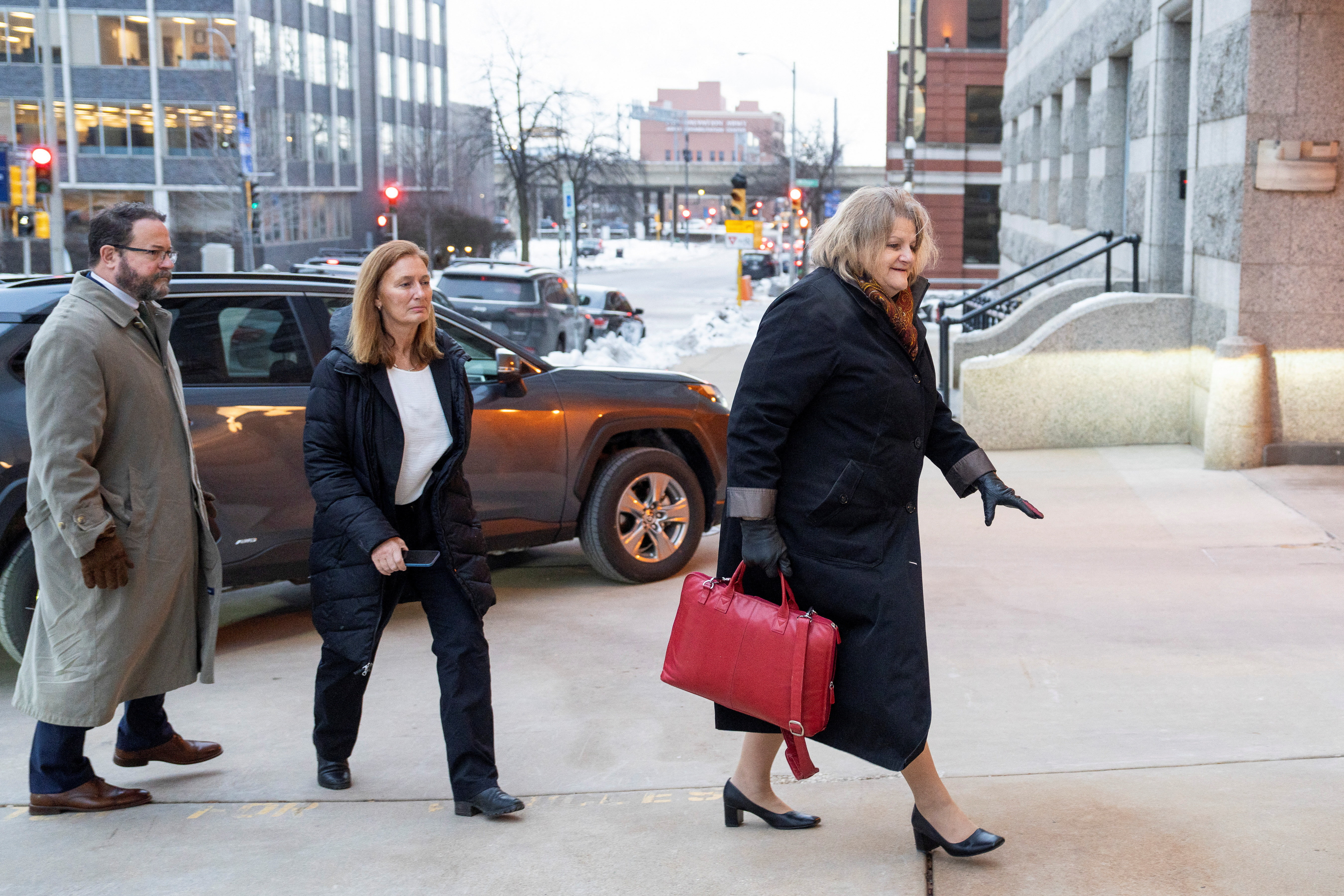 Wisconsin-based Judge Hannah Dugan arrives for the first day of trial, in which she's accused of helping a migrant appearing in her courtroom evade a planned immigration arrest, in Milwaukee, Wisconsin, U.S. December 15, 2025. REUTERS/Sara Stathas