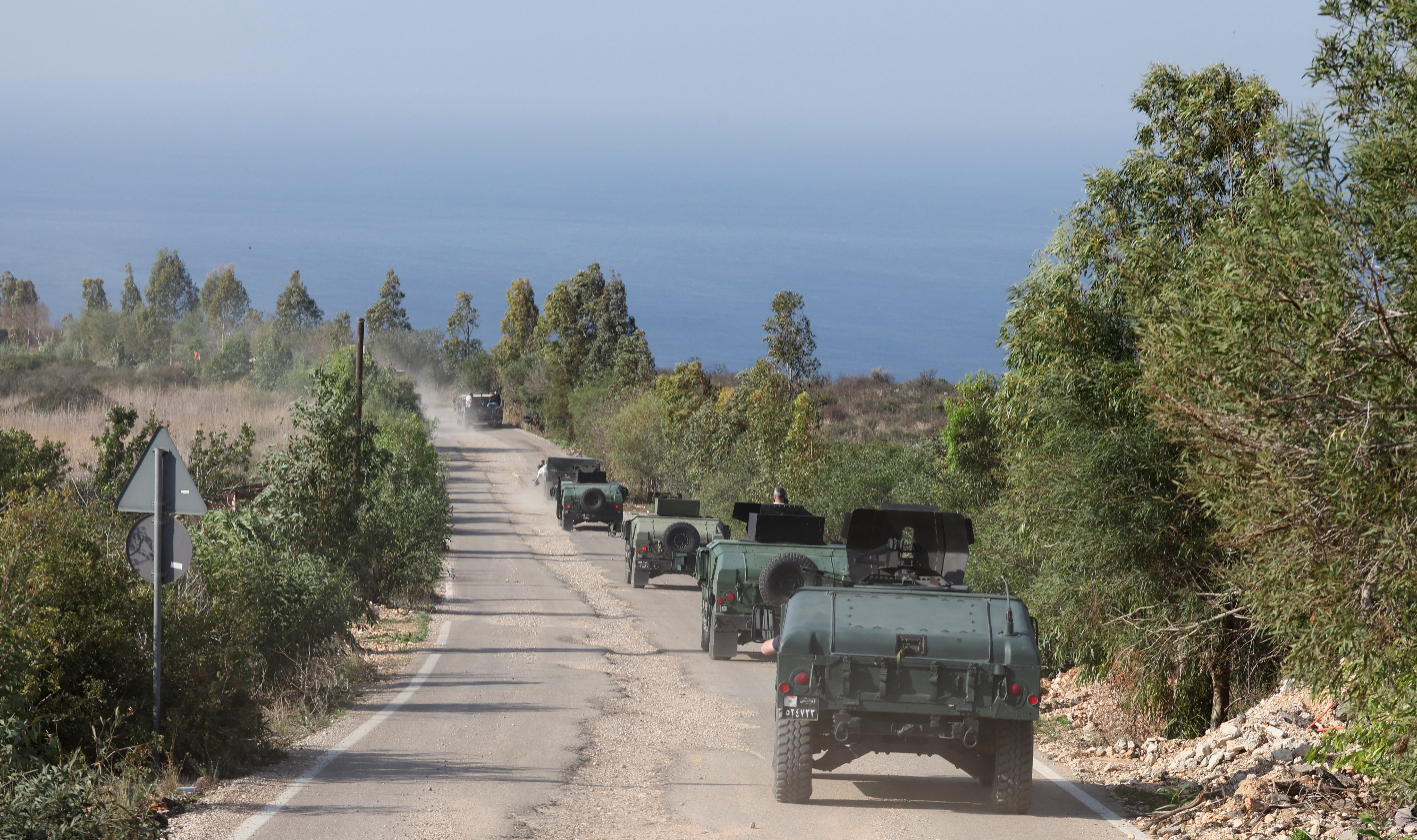 Lebanese army members drive military vehicles during a Lebanese army media tour, to review the army's operations in the southern Litani sector, in Naqoura, near the border with Israel, southern Lebanon, November 28, 2025. REUTERS/Aziz Taher
