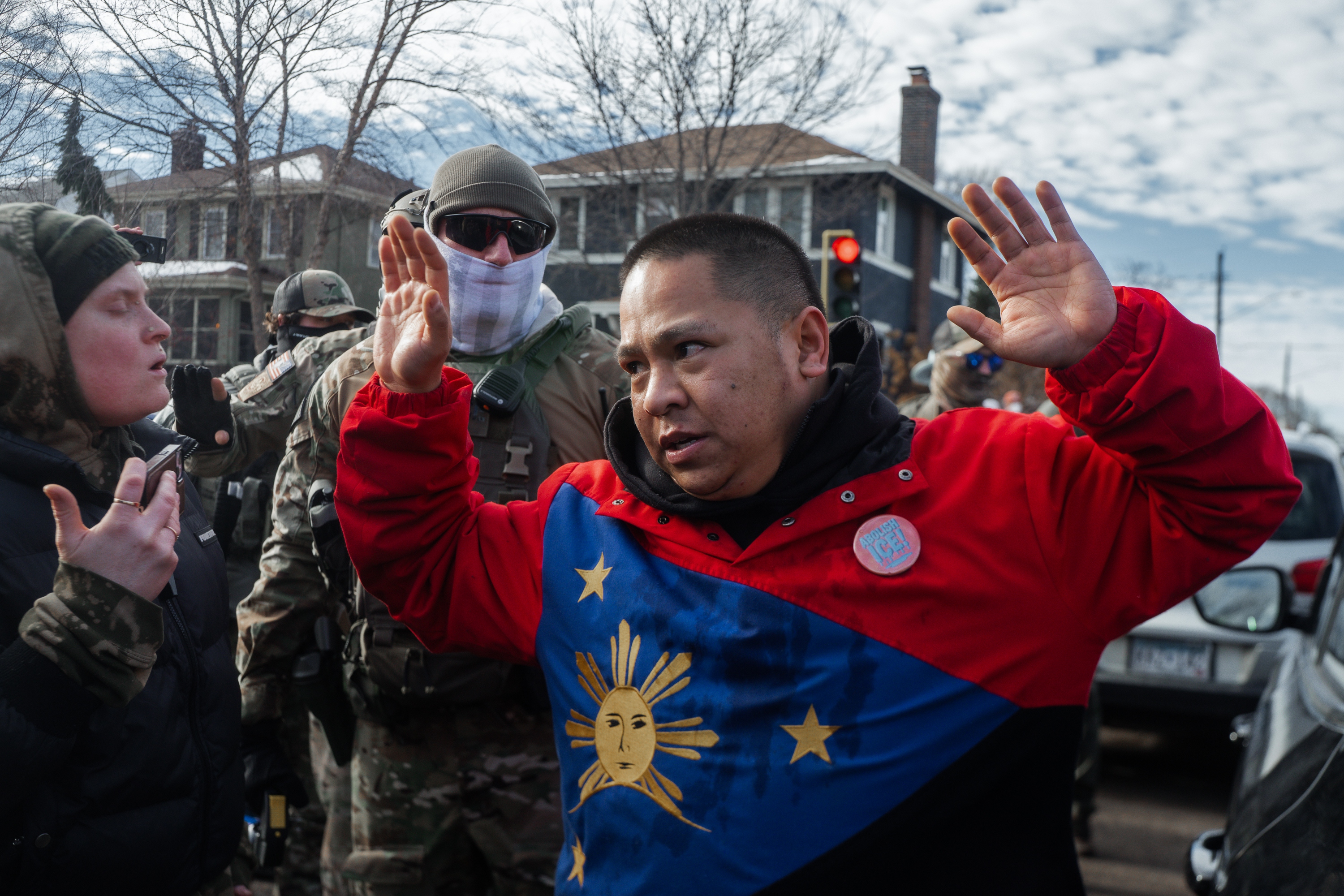 Tensions flare in Minnesota as protesters and federal agents square off