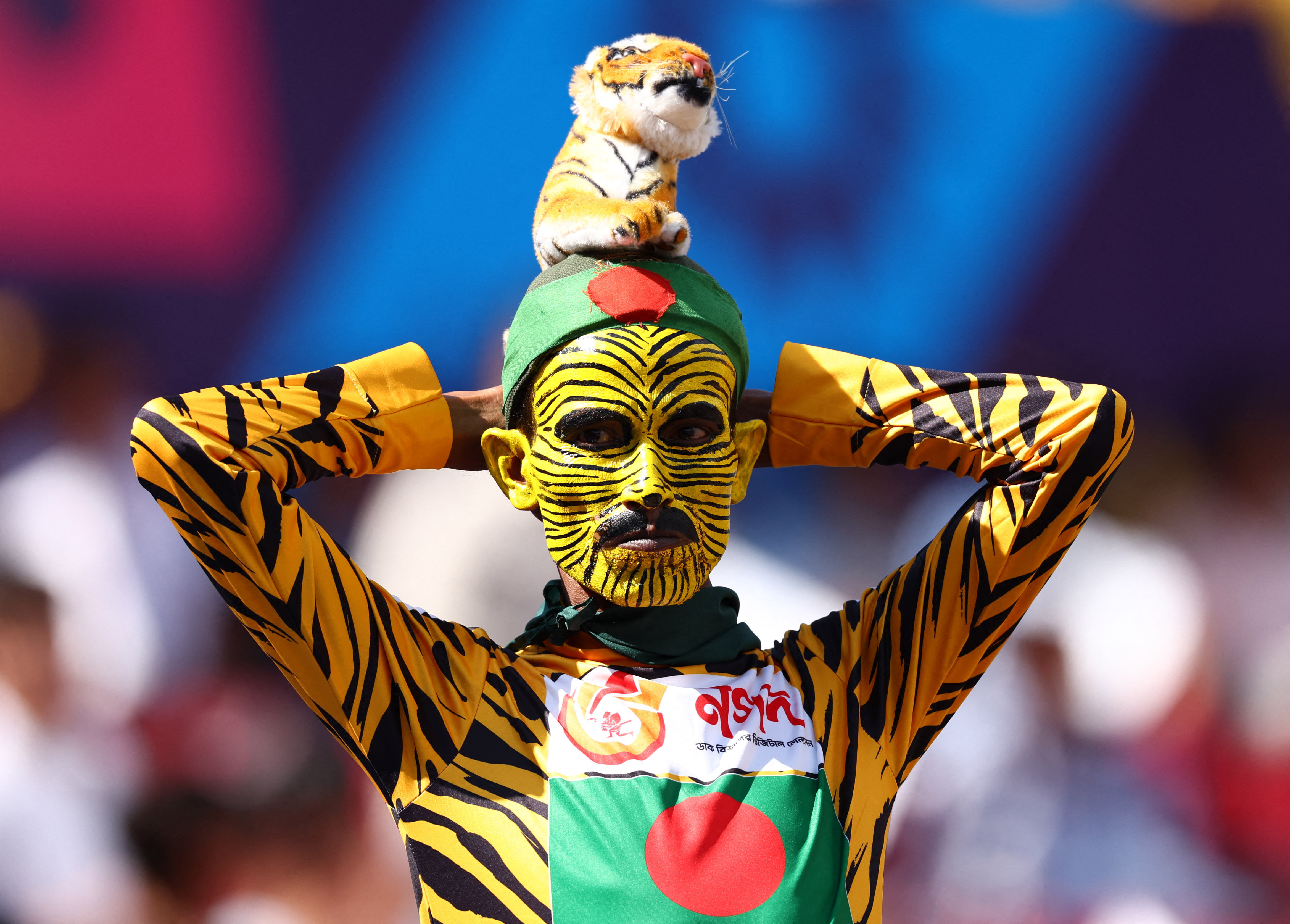 Cricket - ICC Cricket World Cup 2023 - England v Bangladesh - Himachal Pradesh Cricket Association Stadium, Dharamsala, India - October 10, 2023 A Bangladesh fan reacts in the stands during the match REUTERS/Andrew Boyers
