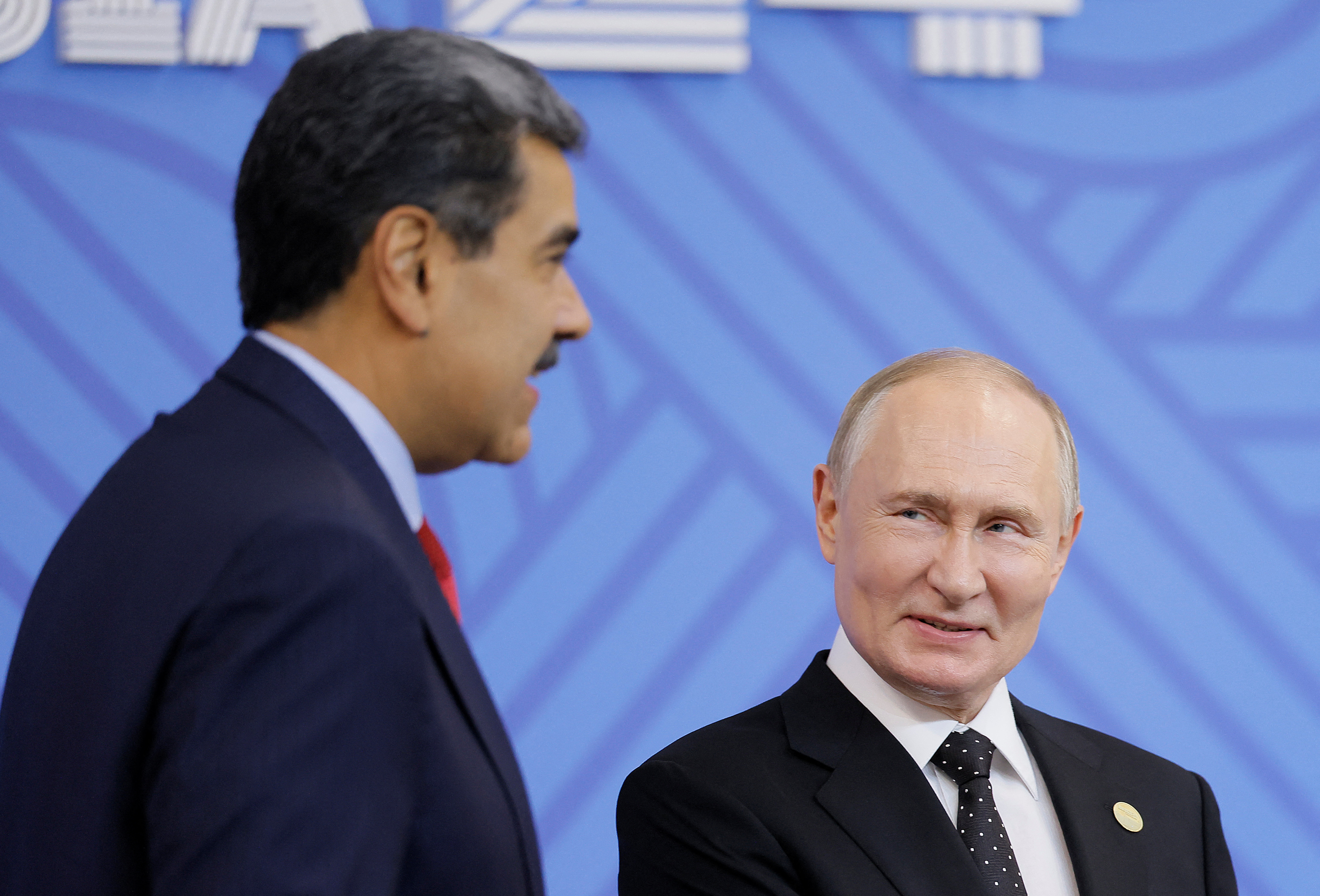 Russian President Vladimir Putin greets Venezuelan President Nicolas Maduro during an official welcoming ceremony for delegations' heads at the BRICS summit in Kazan, Russia October 23, 2024. REUTERS/Maxim Shemetov/Pool