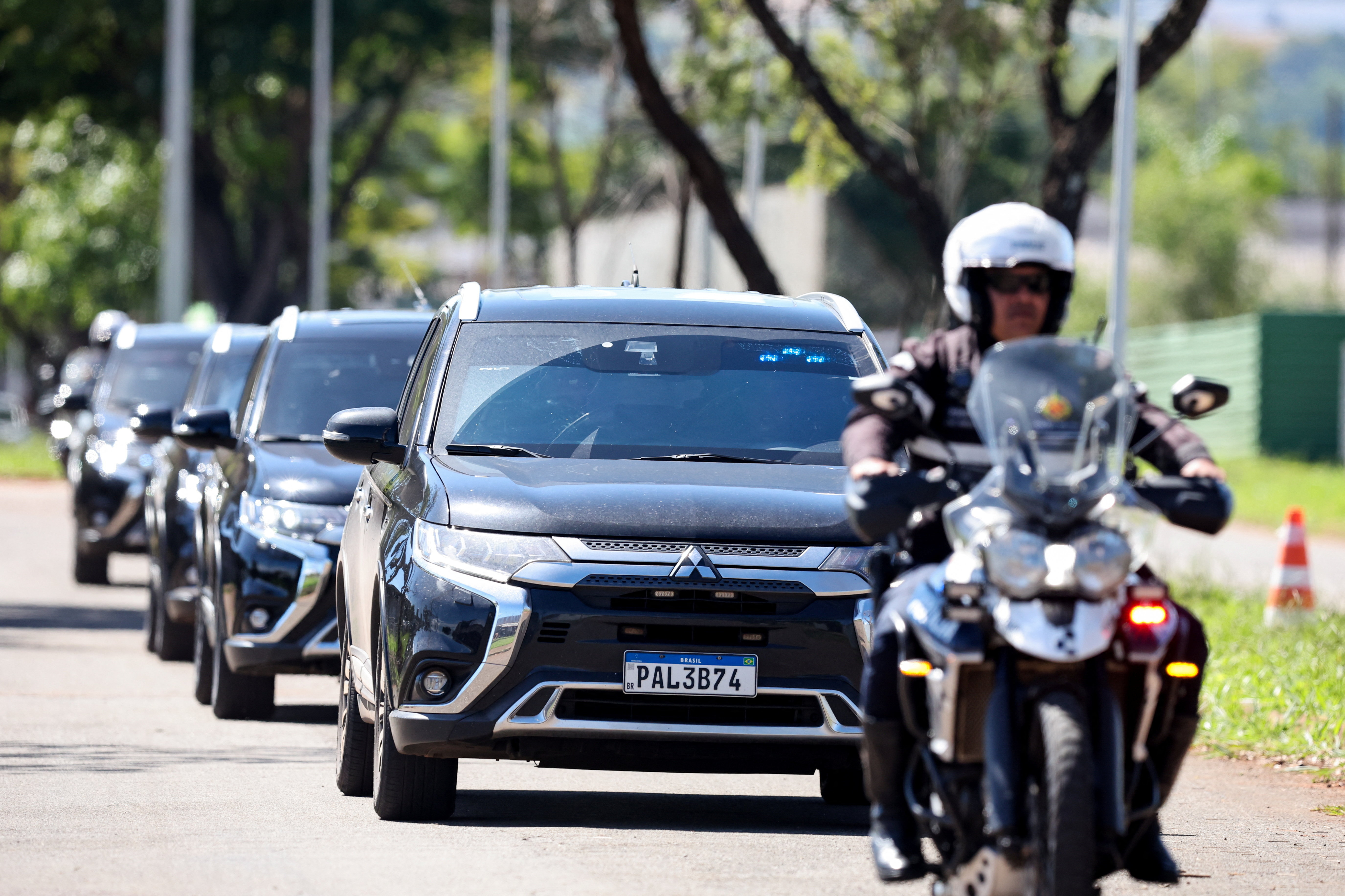 A motorcade takes Jair Bolsonaro to hospital