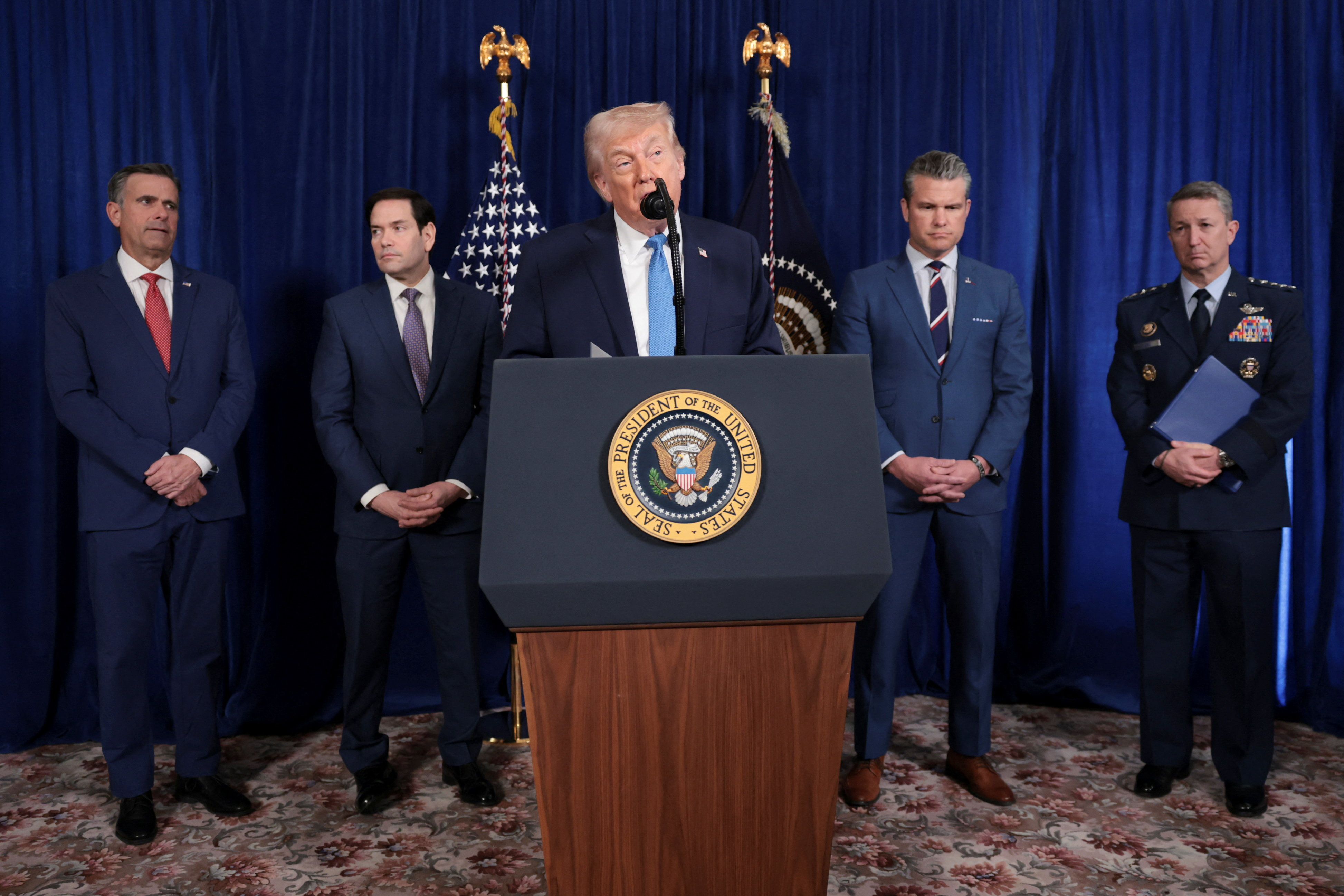 President Donald Trump speaks at a news conference following a US attack on Venezuela, at Mar-a-Lago club in Palm Beach, Florida