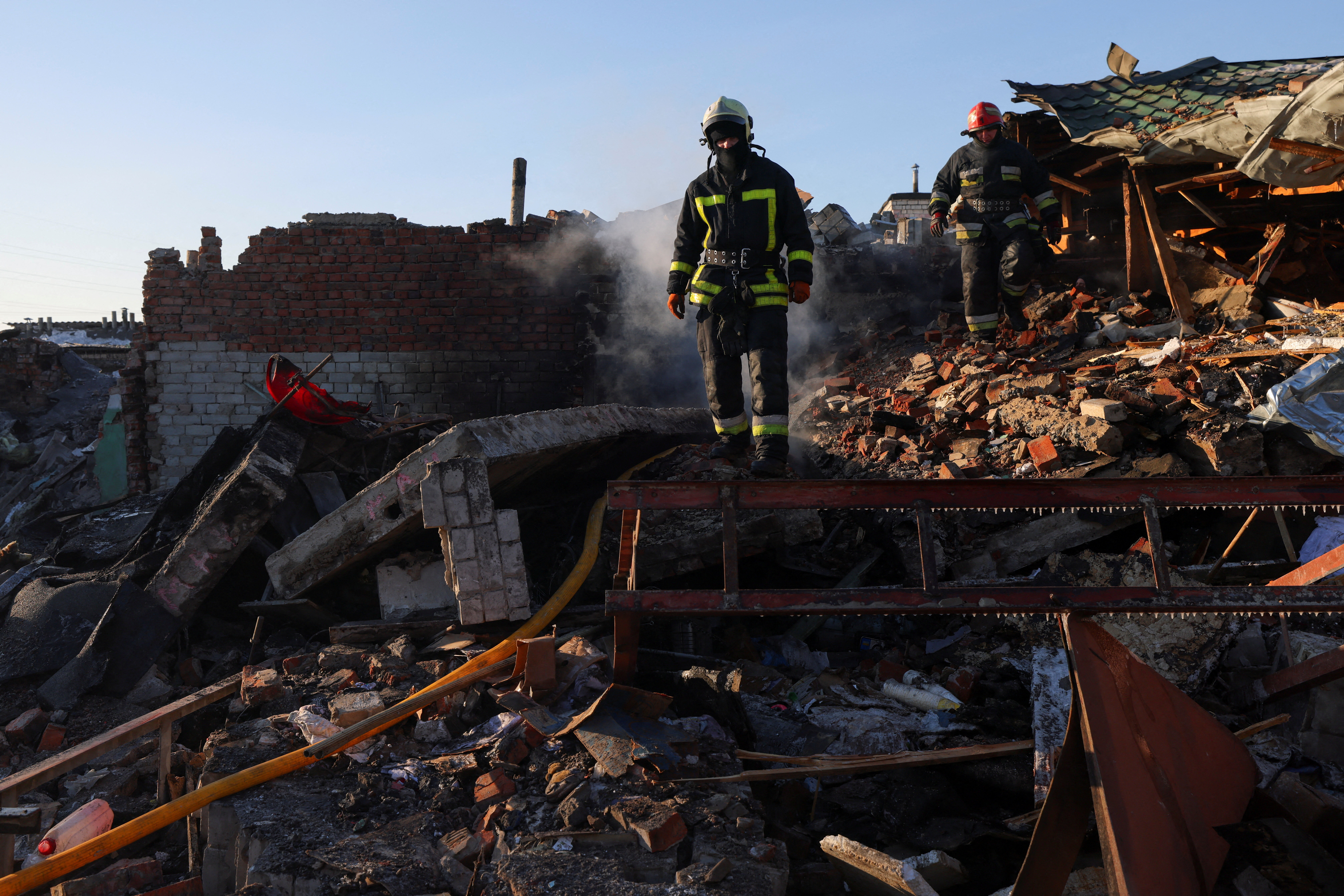 Firefighters work at the site of car garages hit by a Russian missile strike, amid Russia's attack on Ukraine, in Chernihiv, Ukraine, January 5, 2026. REUTERS/Maksym Kishka TPX IMAGES OF THE DAY