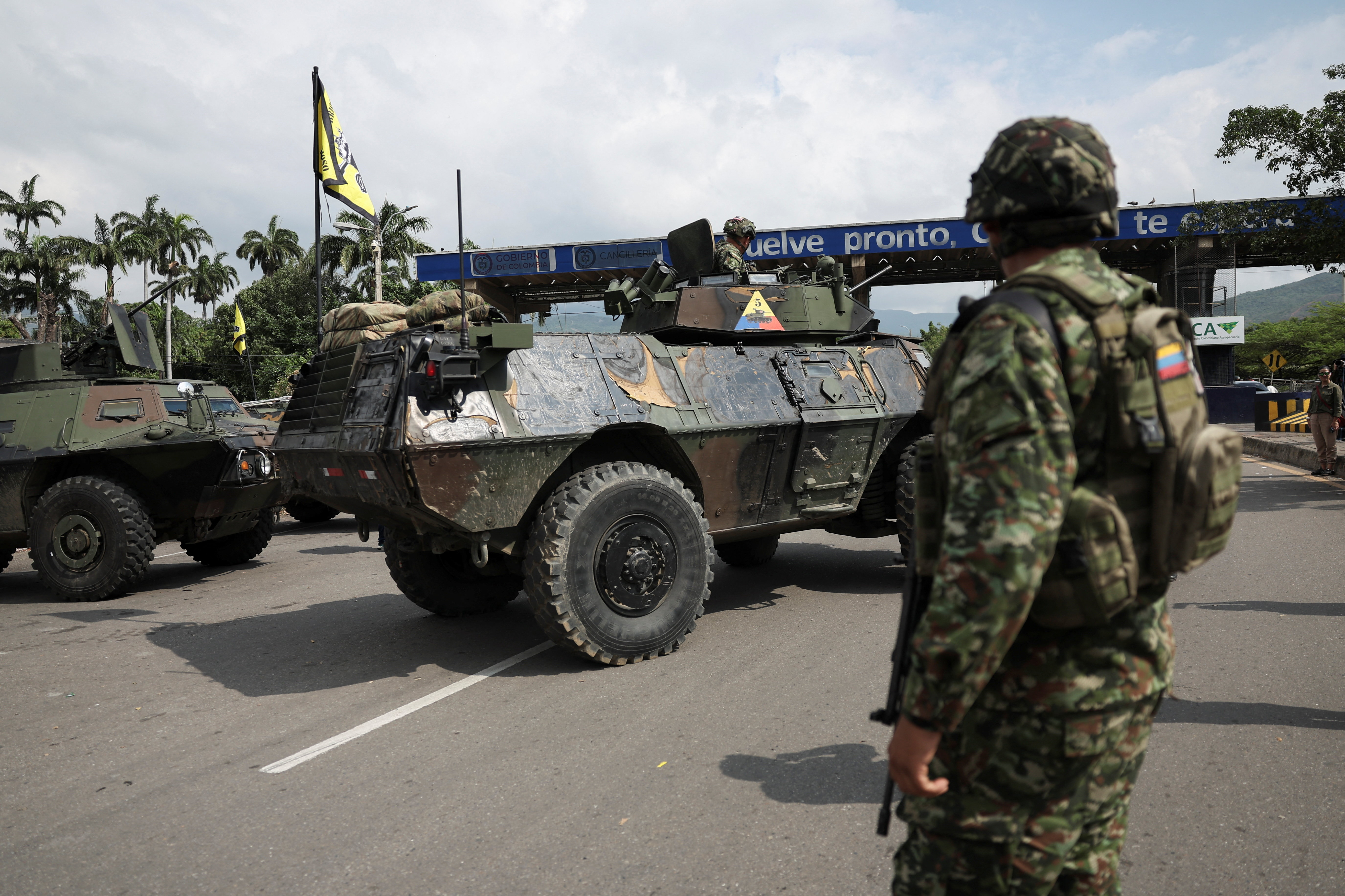 A soldier stands near military vehicles at the border between Venezuela and Colombia in Cucuta, Colombia