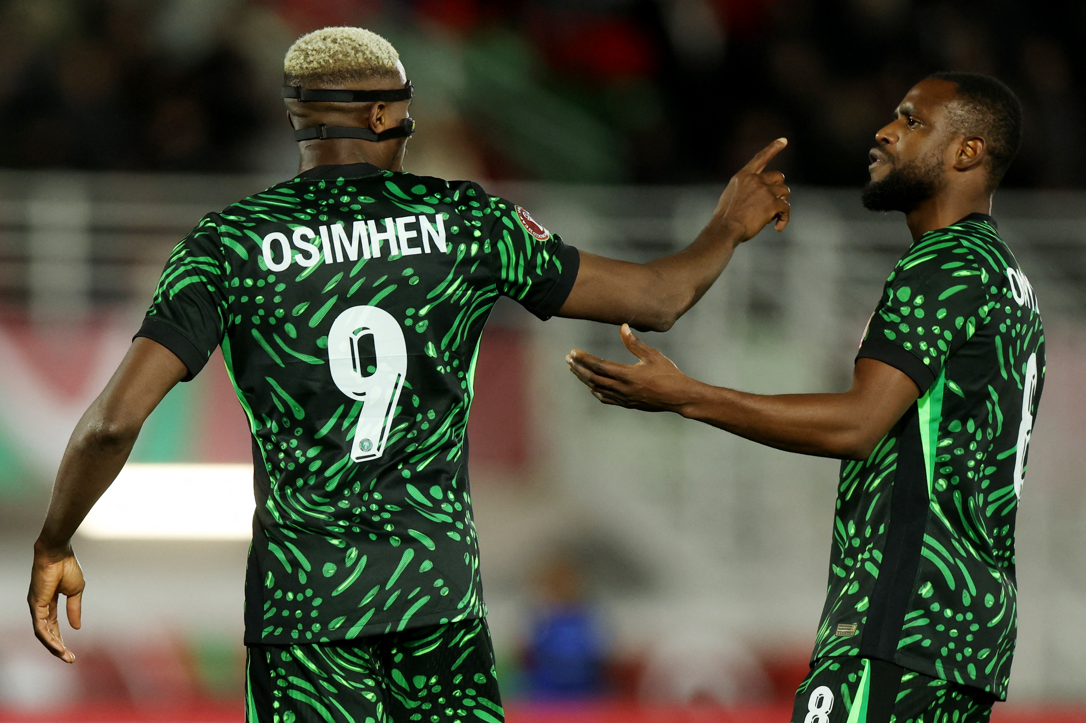 Soccer Football - CAF Africa Cup of Nations - Morocco 2025 - Round of 16 - Nigeria v Mozambique - Fez Stadium, Fes, Morocco - January 5, 2026 Nigeria's Victor Osimhen and Frank Onyeka REUTERS/Amr Abdallah Dalsh