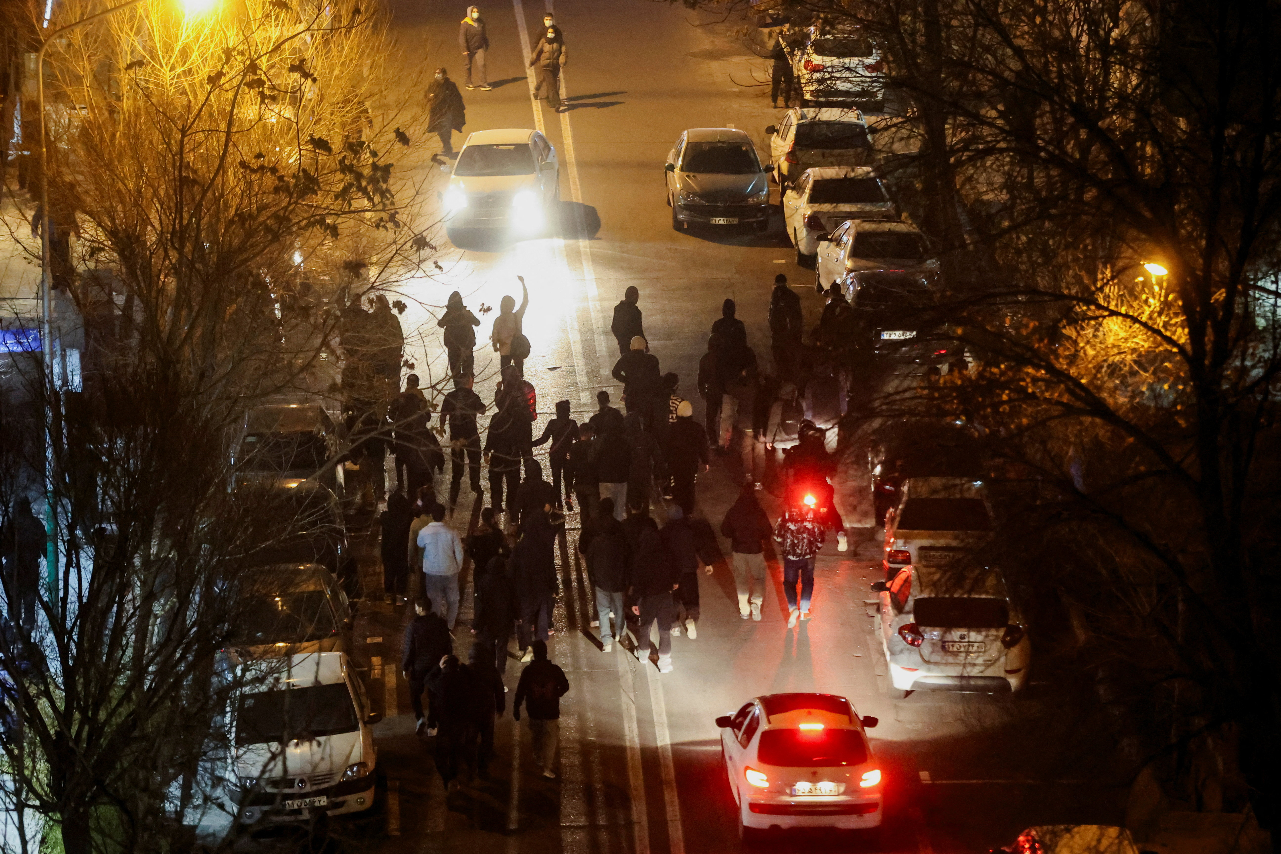 Iranian demonstrators gather in a street during a protest over the collapse of the currency's value, in Tehran, Iran, January 8, 2026. Stringer/WANA (West Asia News Agency) via REUTERS ATTENTION EDITORS - THIS PICTURE WAS PROVIDED BY A THIRD PARTY