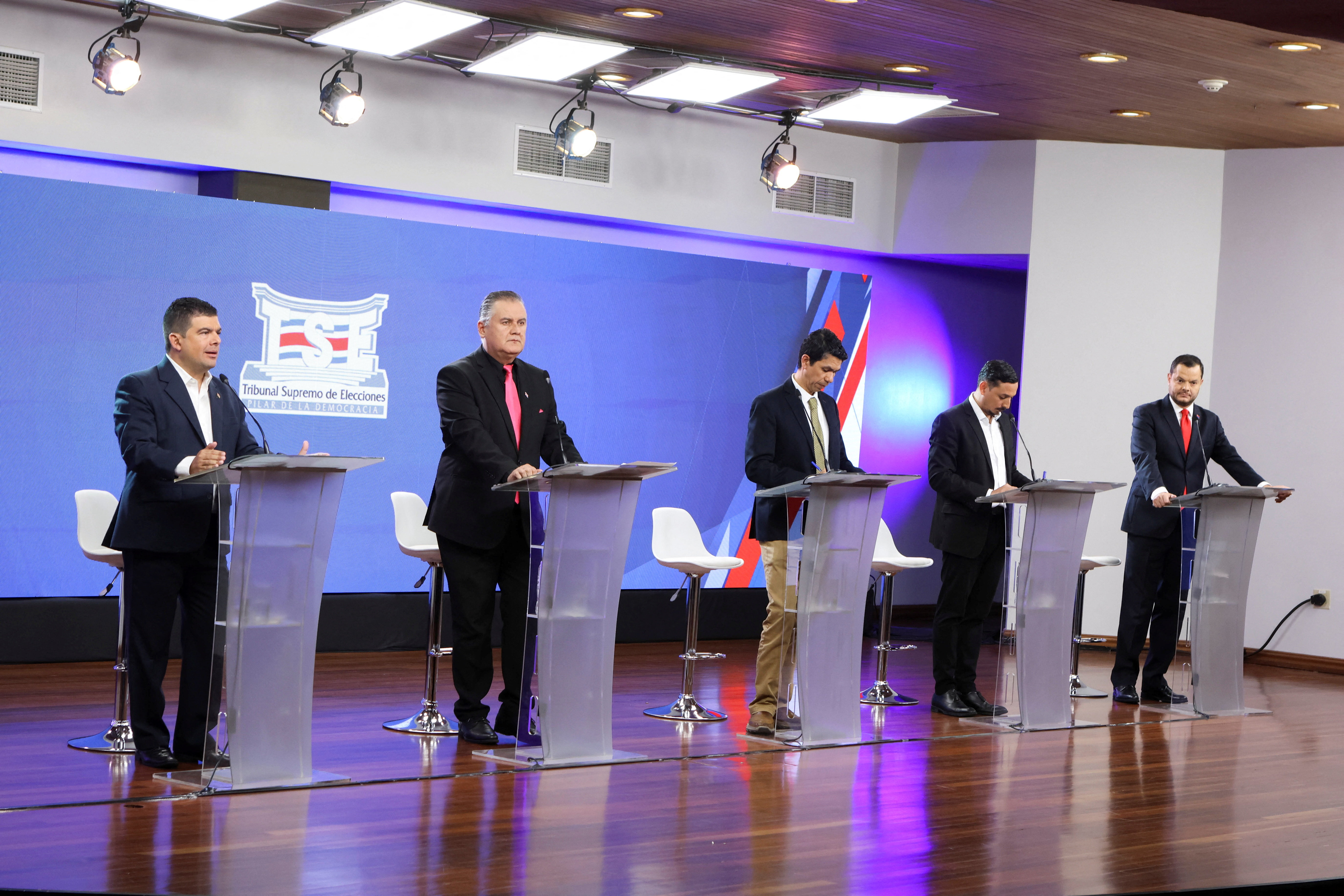Presidential candidates on the debate stage in Costa Rica