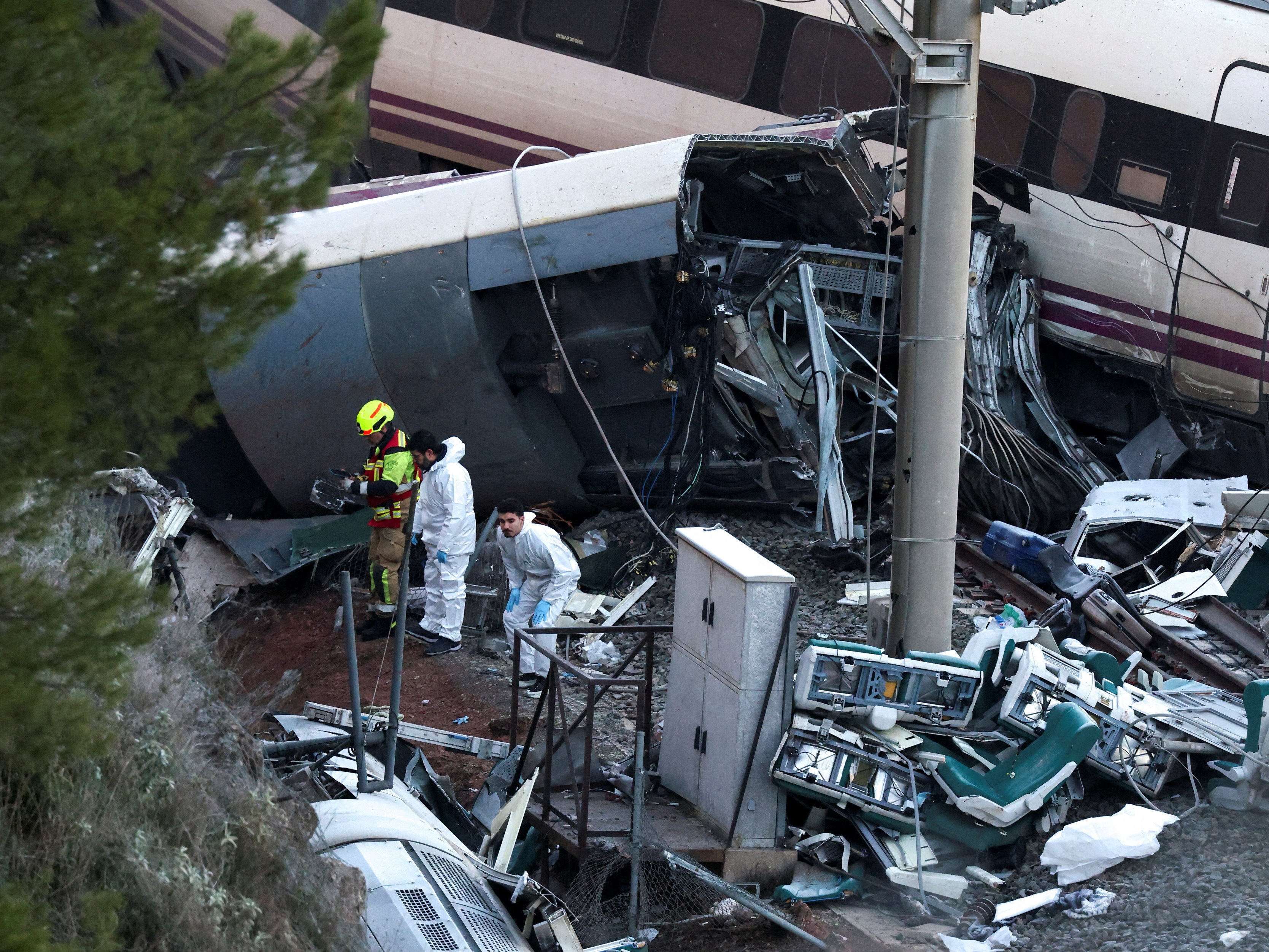 Forensic teams investigate the cause of the accident