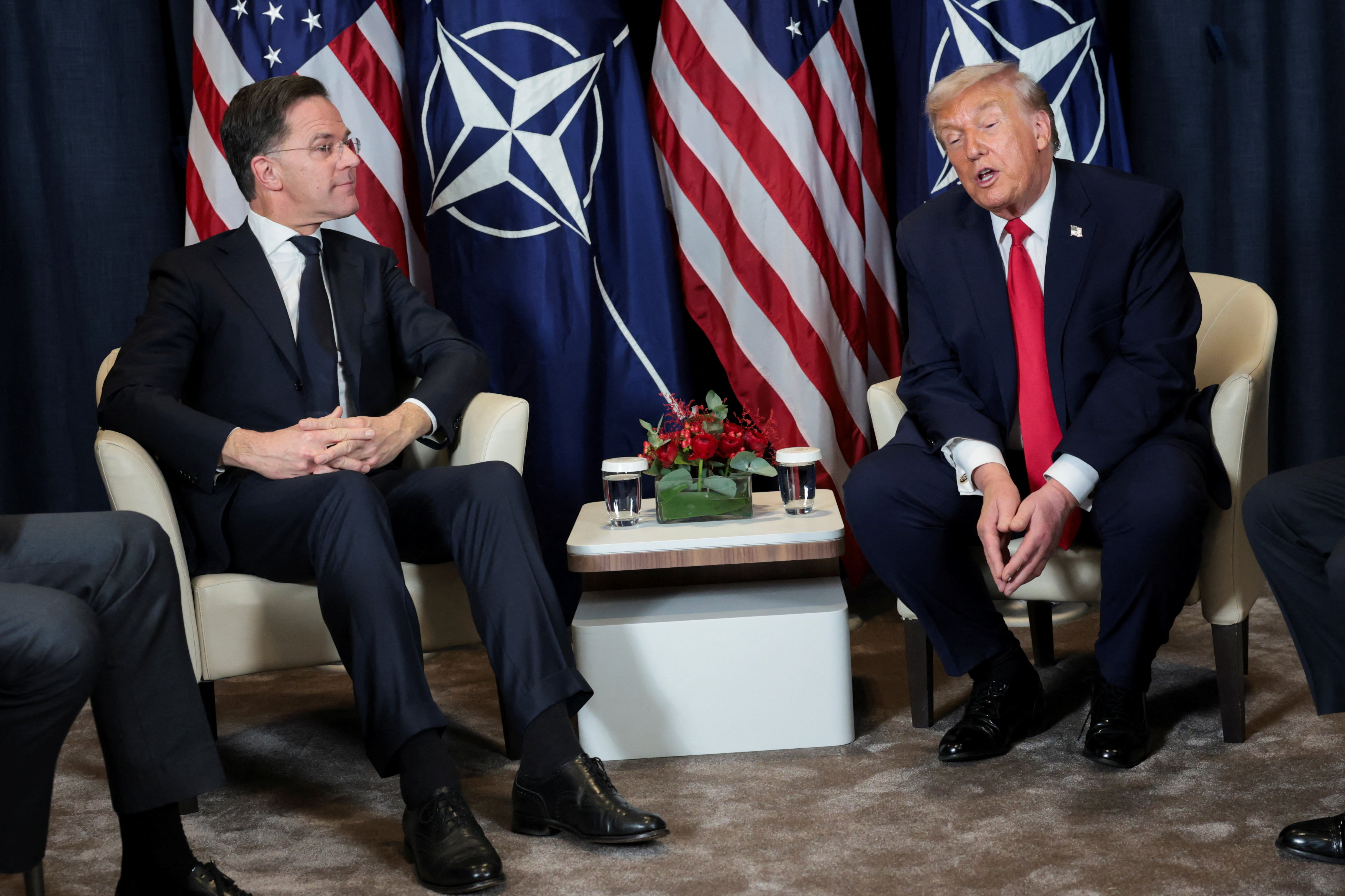 U.S. President Donald Trump holds a bilateral meeting with NATO Secretary General Mark Rutte at the World Economic Forum (WEF) in Davos, Switzerland, January 21, 2026. REUTERS/Jonathan Ernst