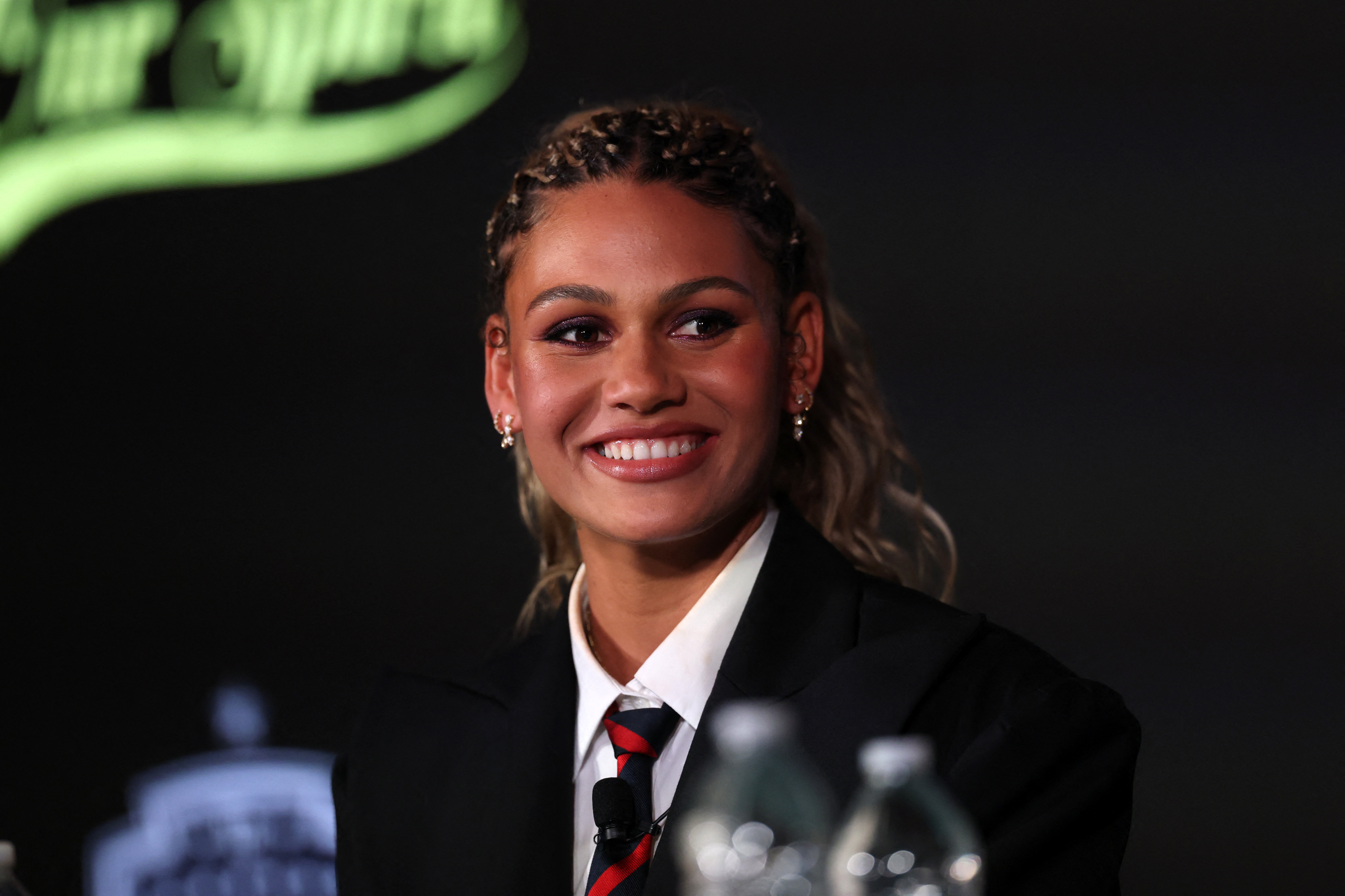 Trinity Rodman of the Washington Spirit answers questions during a press conference at BMO Stadium in Los Angeles