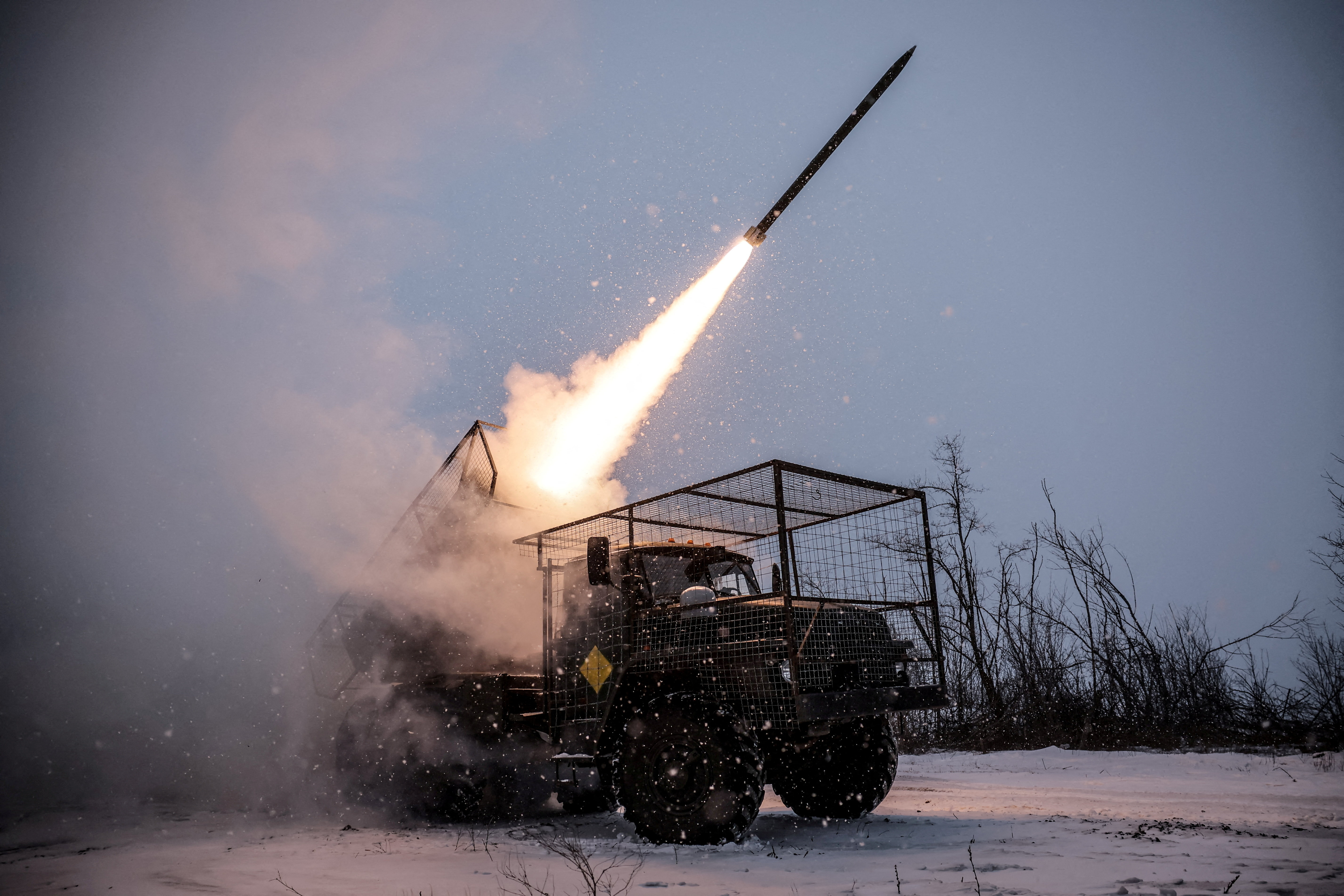 Servicemen of the 24th Separate Mechanized Brigade of the Ukrainian Armed Forces fire a BM-21 Grad multiple launch rocket system towards Russian troops, amid Russia's attack on Ukraine, near the frontline town of Chasiv Yar in Donetsk region, Ukraine January 24, 2026. Oleg Petrasiuk/Press Service of the 24th King Danylo Separate Mechanized Brigade of the Ukrainian Armed Forces/Handout via REUTERS ATTENTION EDITORS - THIS IMAGE HAS BEEN SUPPLIED BY A THIRD PARTY. TPX IMAGES OF THE DAY