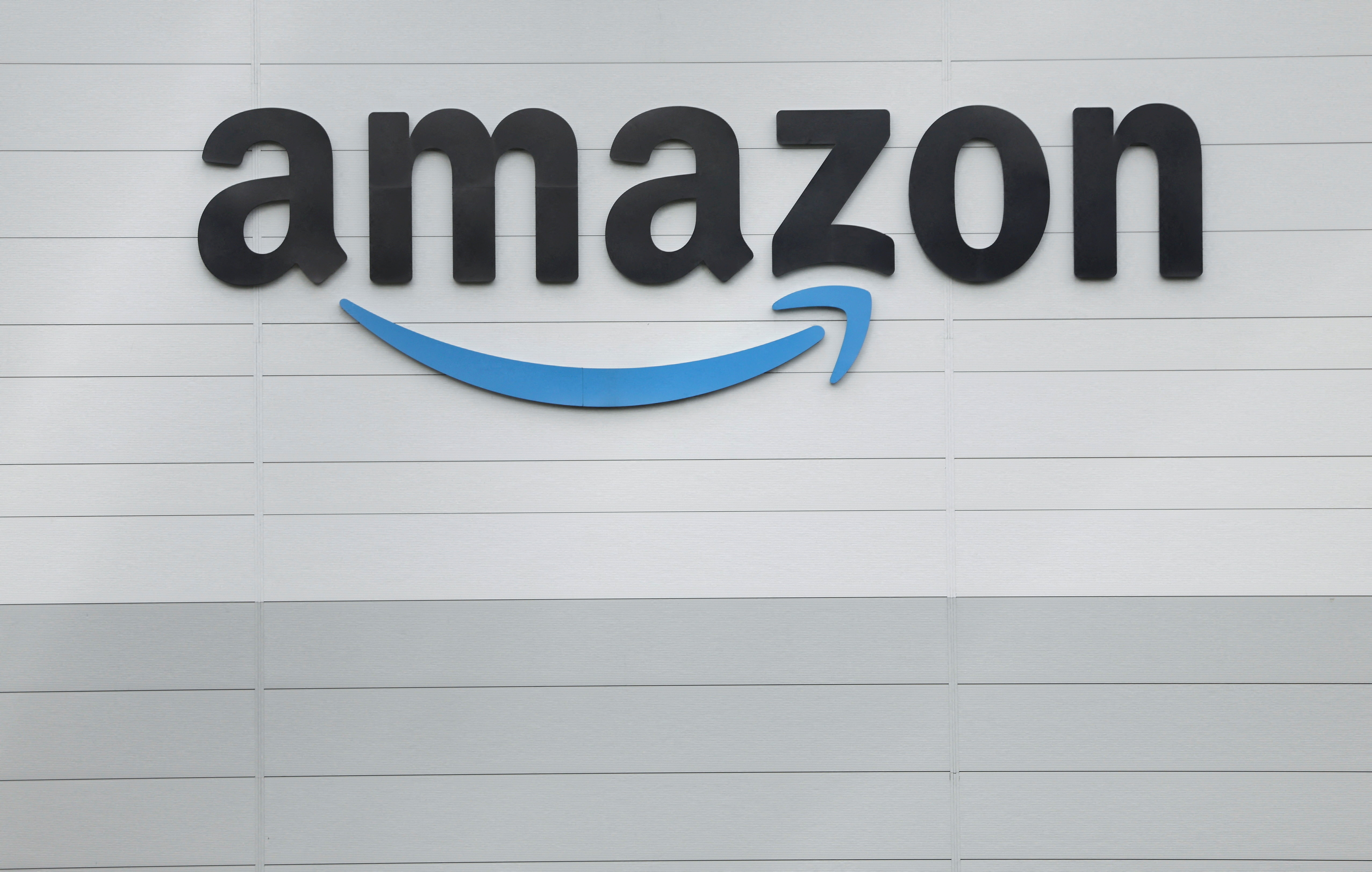 The cuts come as the company also focuses on broader restructuring efforts including closing its Amazon Fresh and Go brick and mortar grocery stores in addition to headcount reductions [File: Damien Eagers/Reuters]
