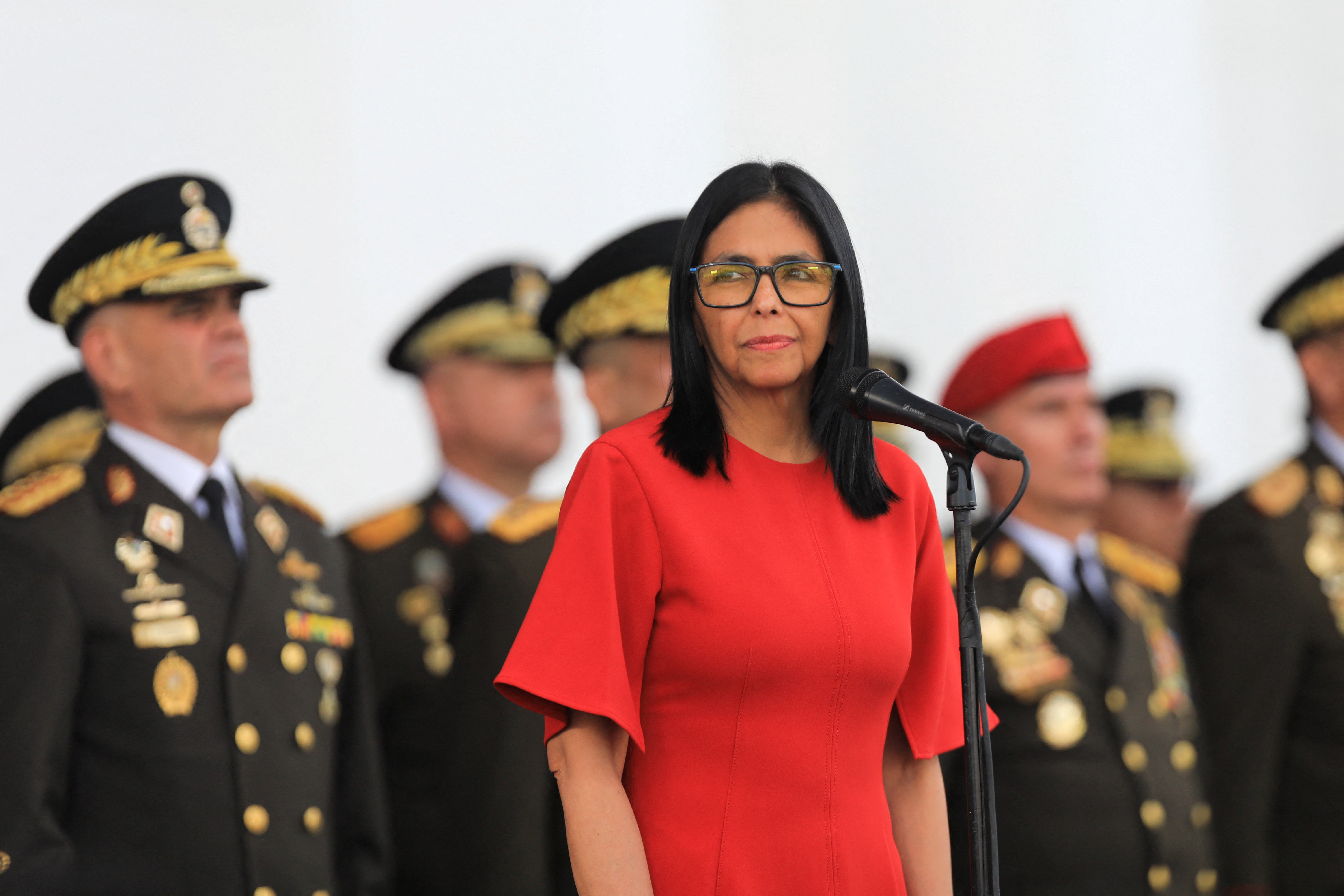 Venezuela's interim President Delcy Rodriguez attends an event to receive the insignia of the commander-in-chief of the Armed Forces next to Venezuela's Defence Minister Vladimir Padrino Lopez, after assuming the presidency following the U.S. ouster of president Nicolas Maduro, at Fort Tiuna, in Caracas, Venezuela, January 28, 2026. Wendys Olivo/Miraflores Palace/Handout via REUTERS ATTENTION EDITORS - THIS IMAGE HAS BEEN SUPPLIED BY A THIRD PARTY