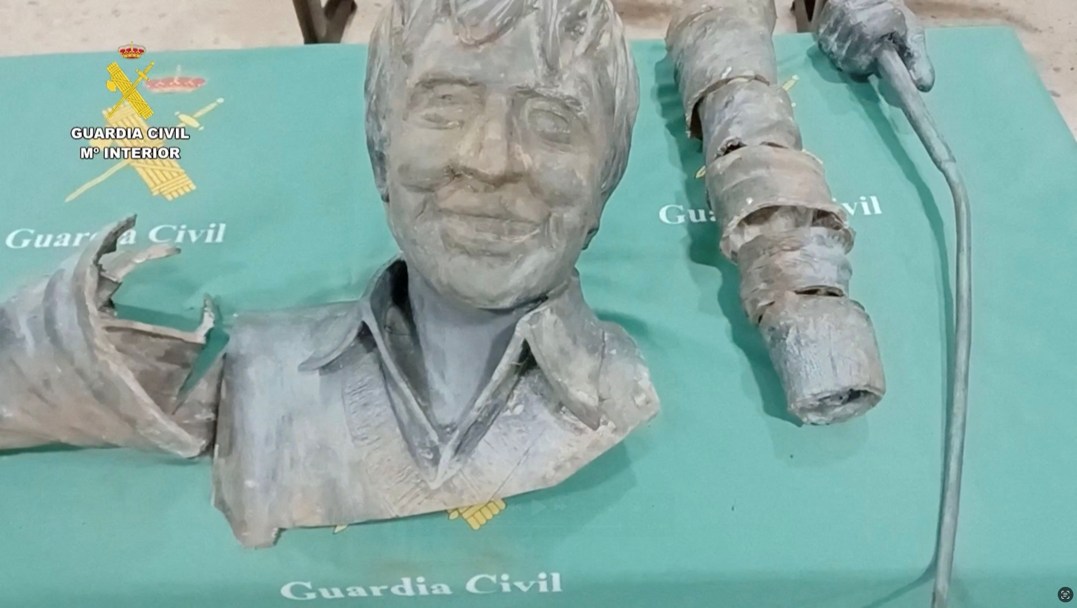A screengrab from a handout video shows pieces of a statue of Seve Ballesteros, a late Spanish professional golfer, recovered by members of the Spanish law enforcement, in Santander, Spain