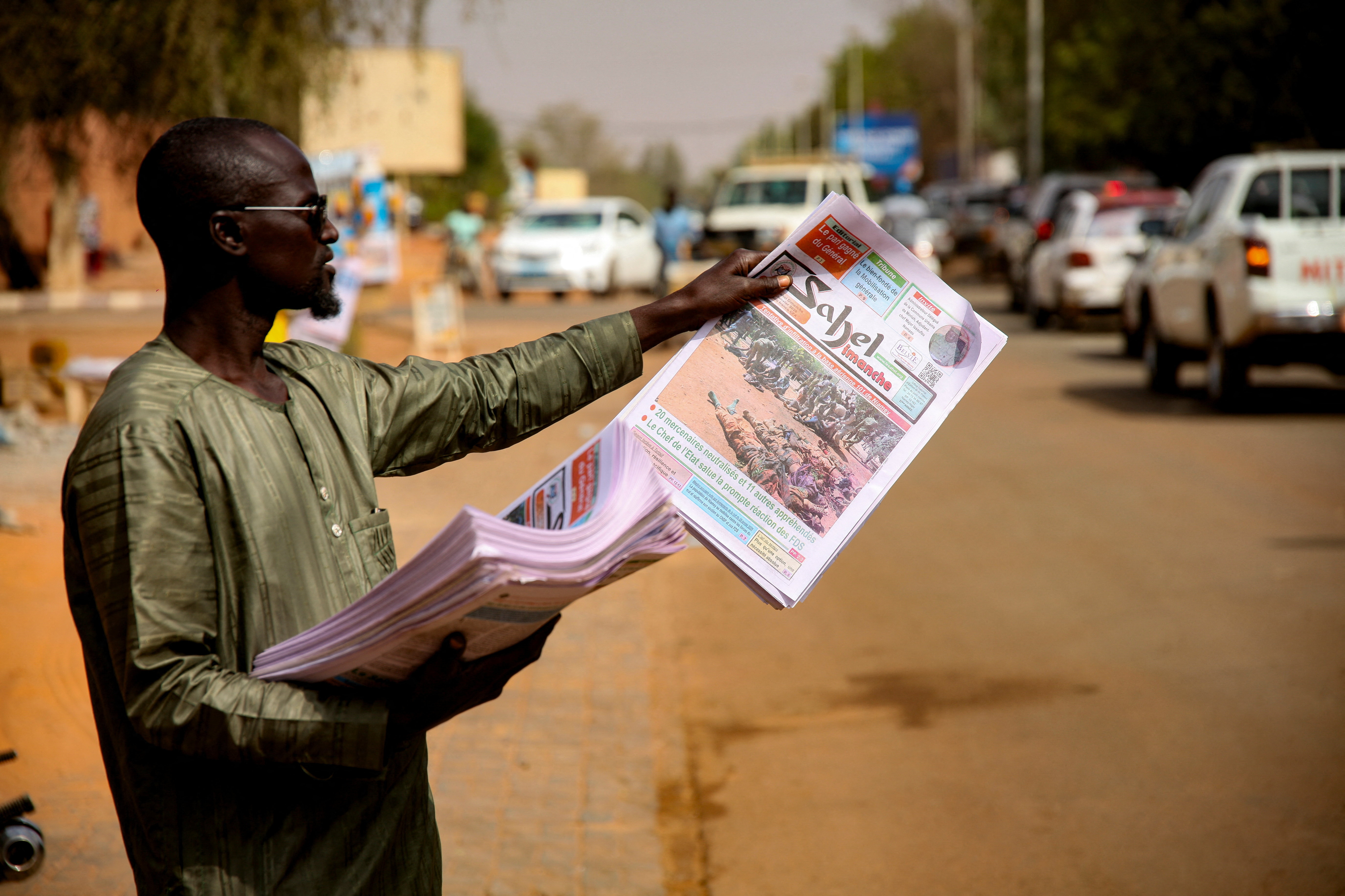 Newspaper vendor in Niamey