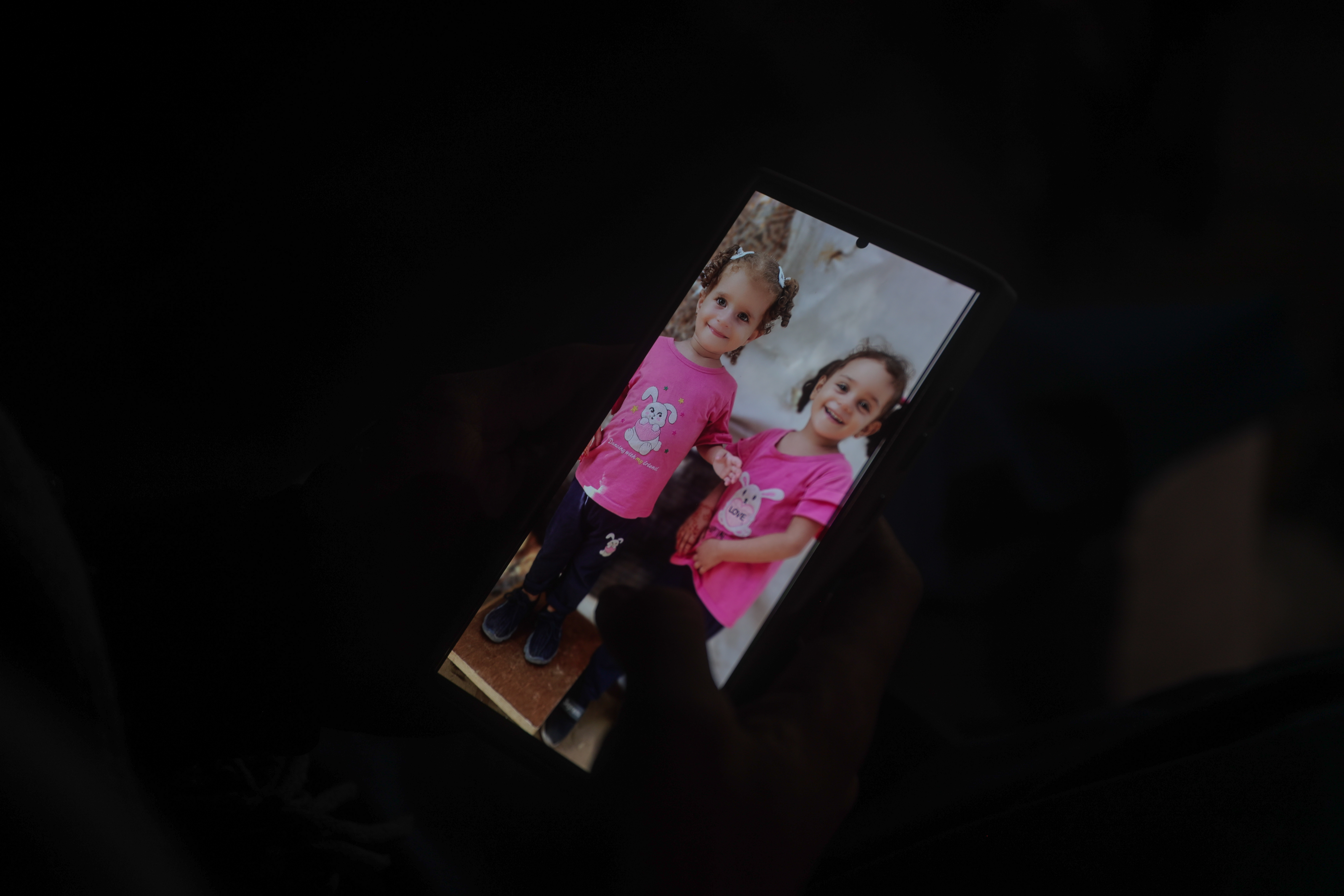 Picture of Diaa's two daughters Hala and Sama on his phone