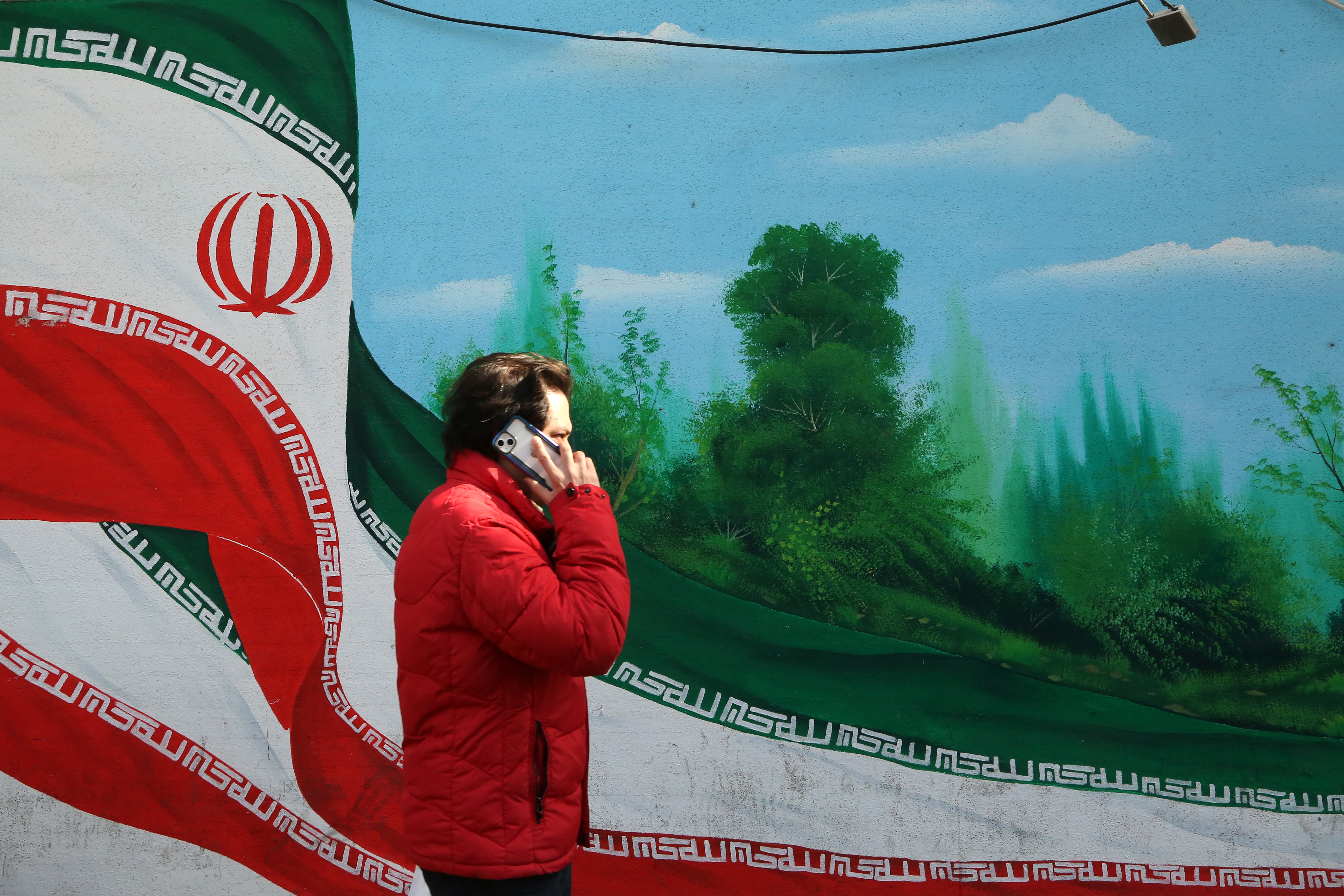 Anti-American posters and Iranian flags displayed in Tehran