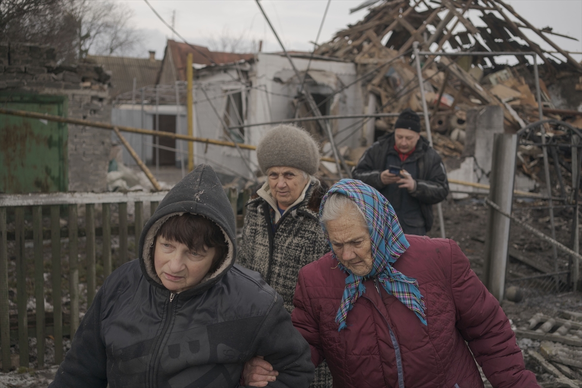 Citizens move away from homes that were damaged, and some completely destroyed, following Russian Shahed drone attack in Vilnyansk, Zaporizhia, Ukraine on January 29, 2026. Three people were killed in the attack: a 62-year-old man and two women aged 26 and 50. Seven private homes were damaged, one of which was completely destroyed. Photojournalist:Jose Colon